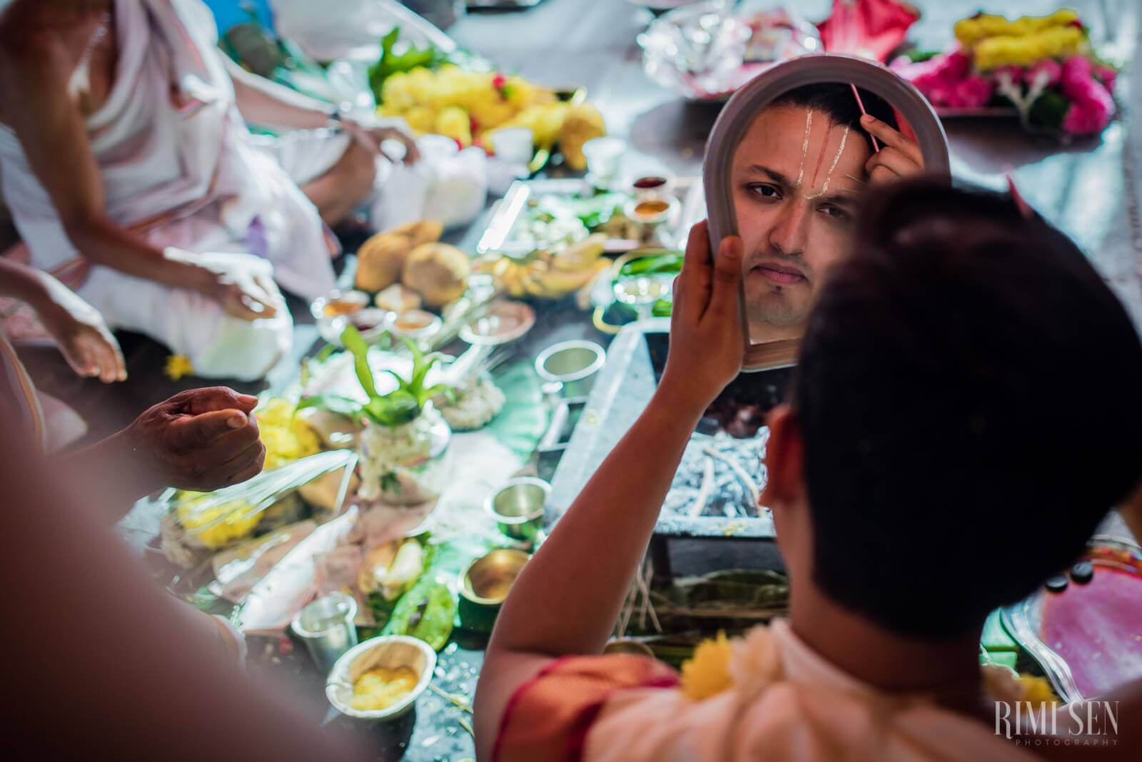 Pooja and Aniket share an intimate meal with colorful flowers and fresh dishes at their Bangalore wedding celebration