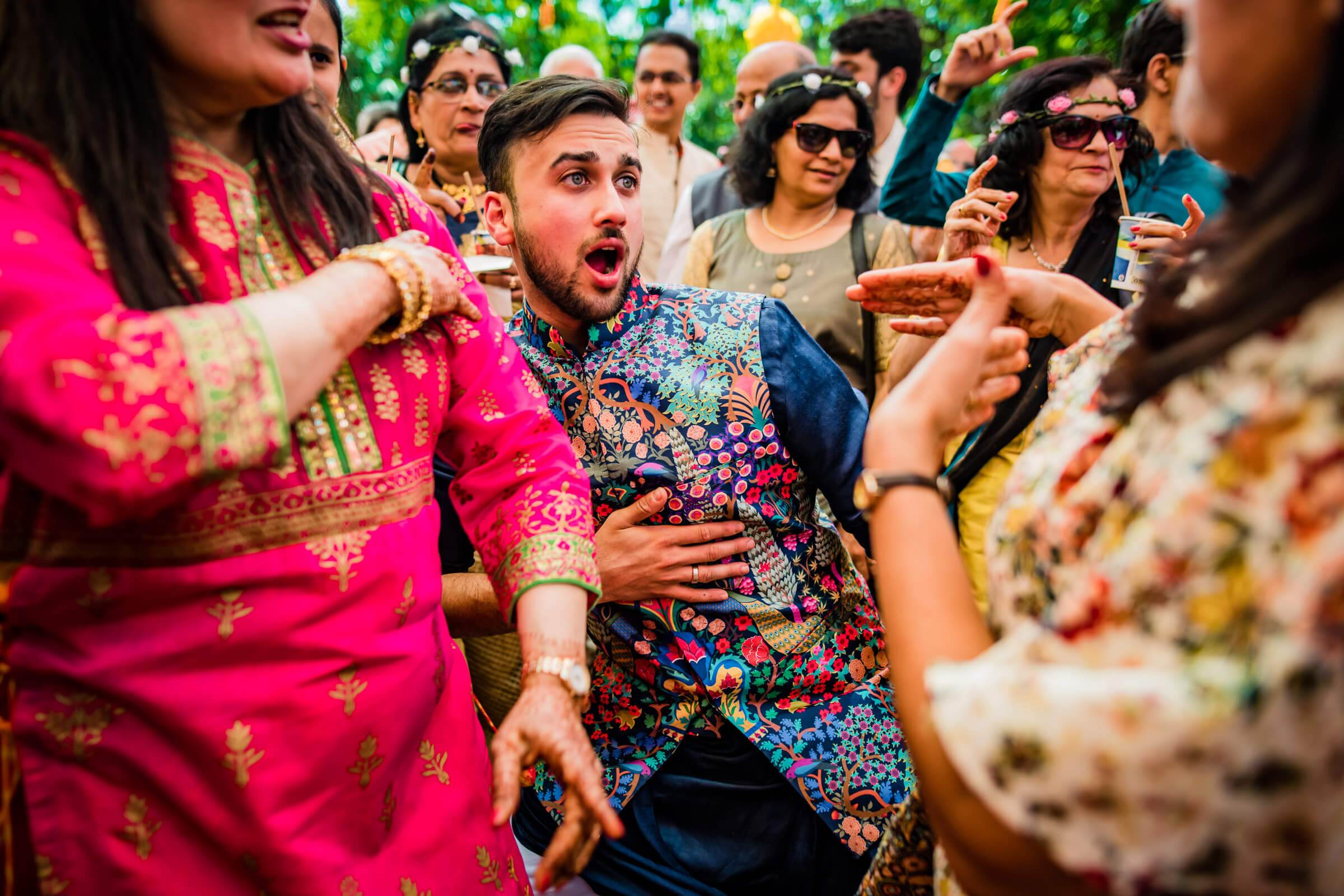 Shreya and Yash celebrate with guests in colorful traditional attire at their Mahabaleshwar wedding festivities