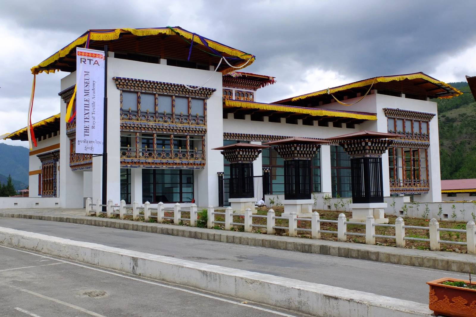 The Textile Museum building of the Royal Textile Academy in Thimphu, its banner by the entrance