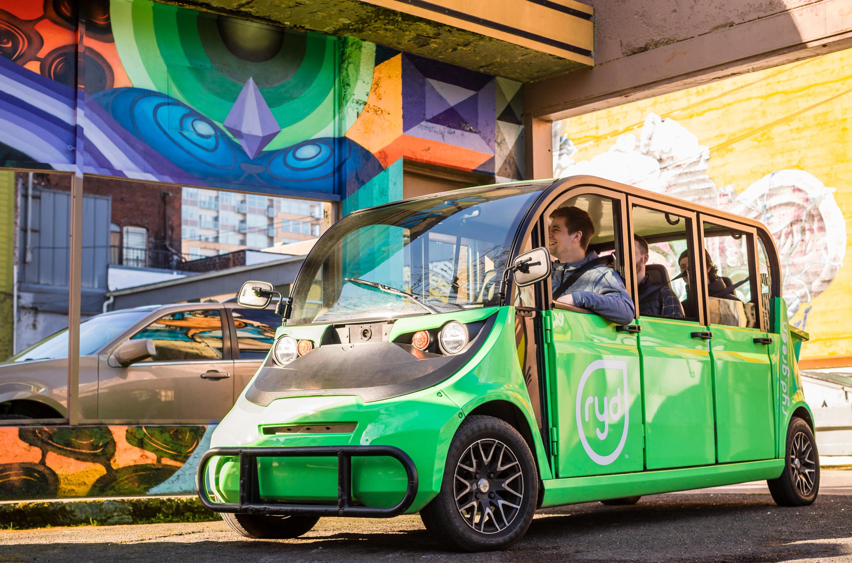 Electric Ryd Car near a mural in downtown Vancouver, WA