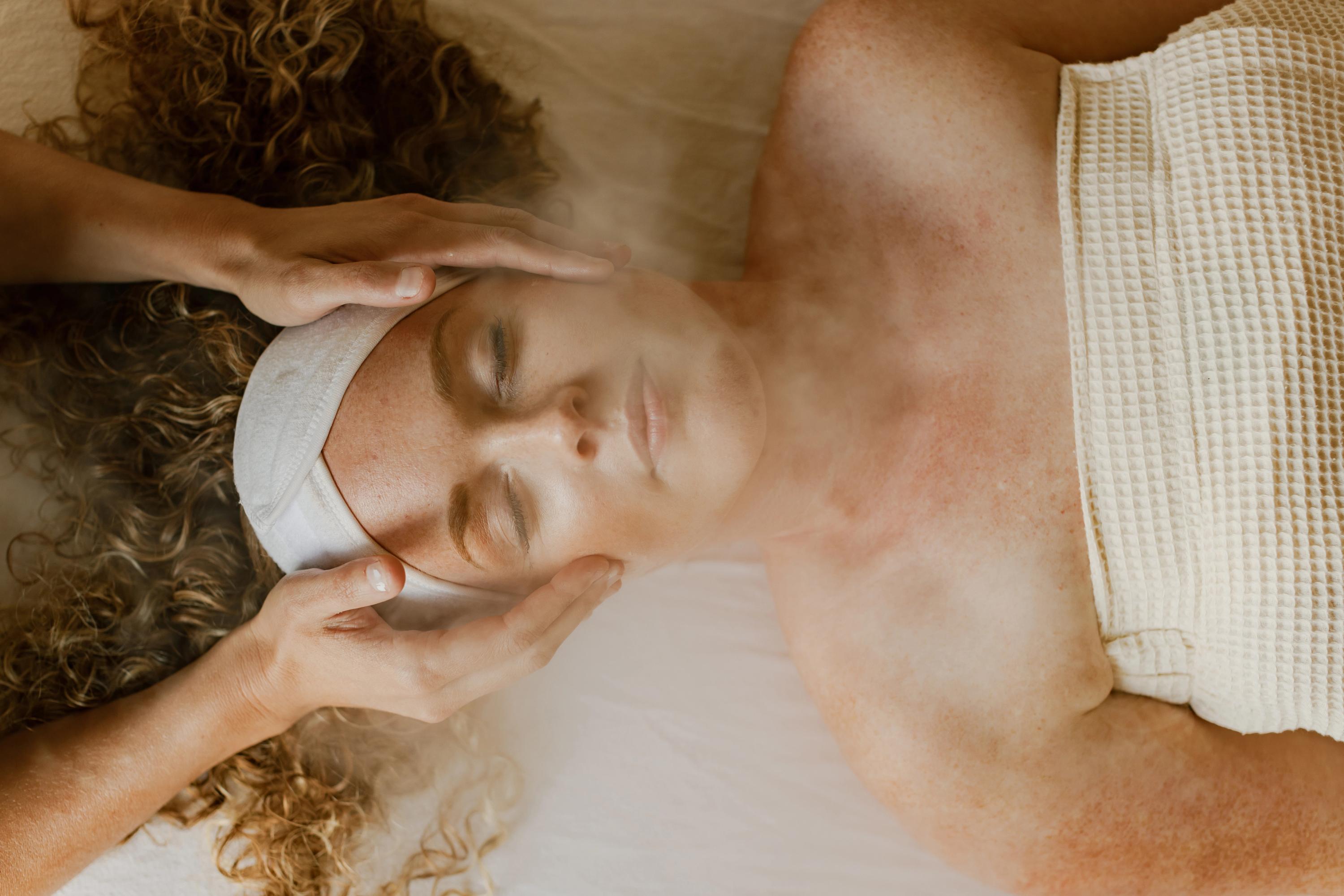 Woman receiving a wellness therapy at Vancouver Wellness Studio