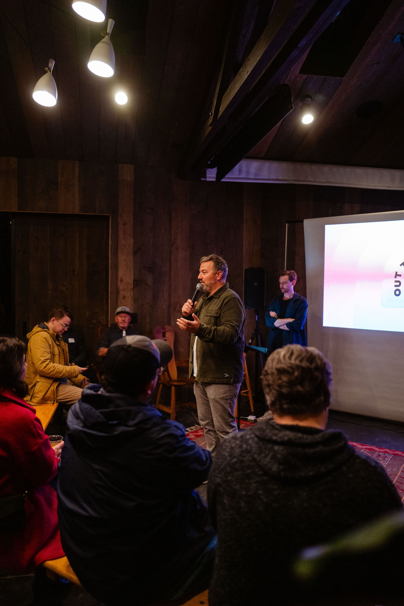 Jake from Riff introducing the guest speaker at the Out the Door event