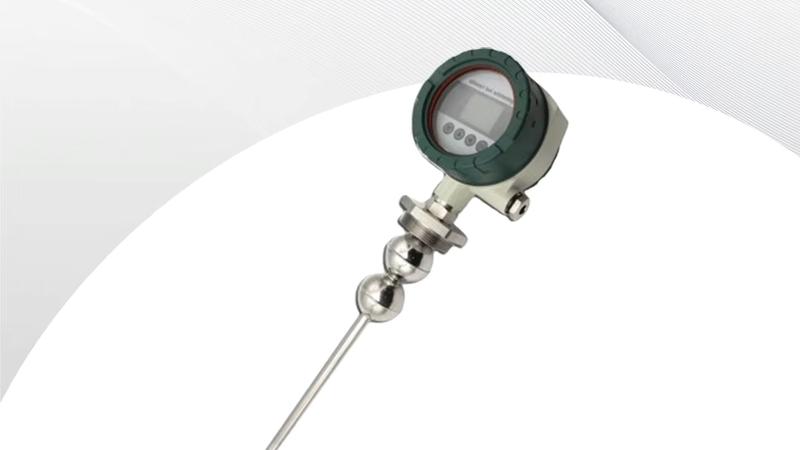 Illustration of a magnetostrictive level gauge mounted on the top nozzle of a large industrial storage tank, the probe extending into the vessel with a float riding the liquid surface, and a transmitter head displaying the level reading