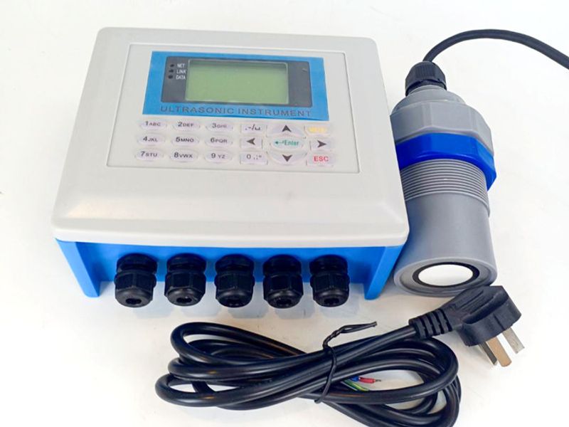 Split ultrasonic level meter controller and transducer