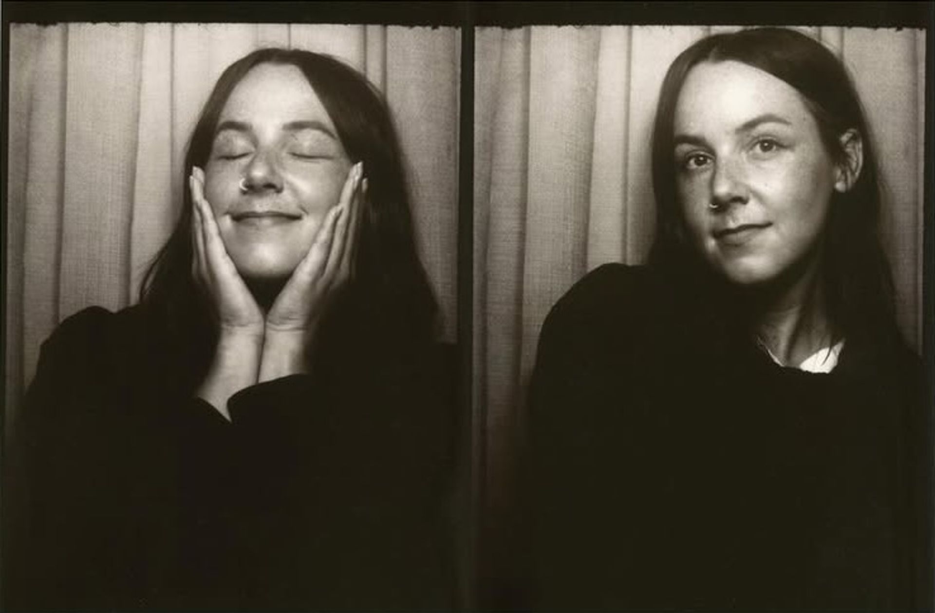 Accessibility Alt Text:  Black and white photobooth portraits of a woman with long dark hair, smiling softly in one frame and gently holding her face with both hands in the other.  SEO Caption:  Portrait diptych — intimate black-and-white photobooth self-portrait capturing quiet expression and natural warmth.