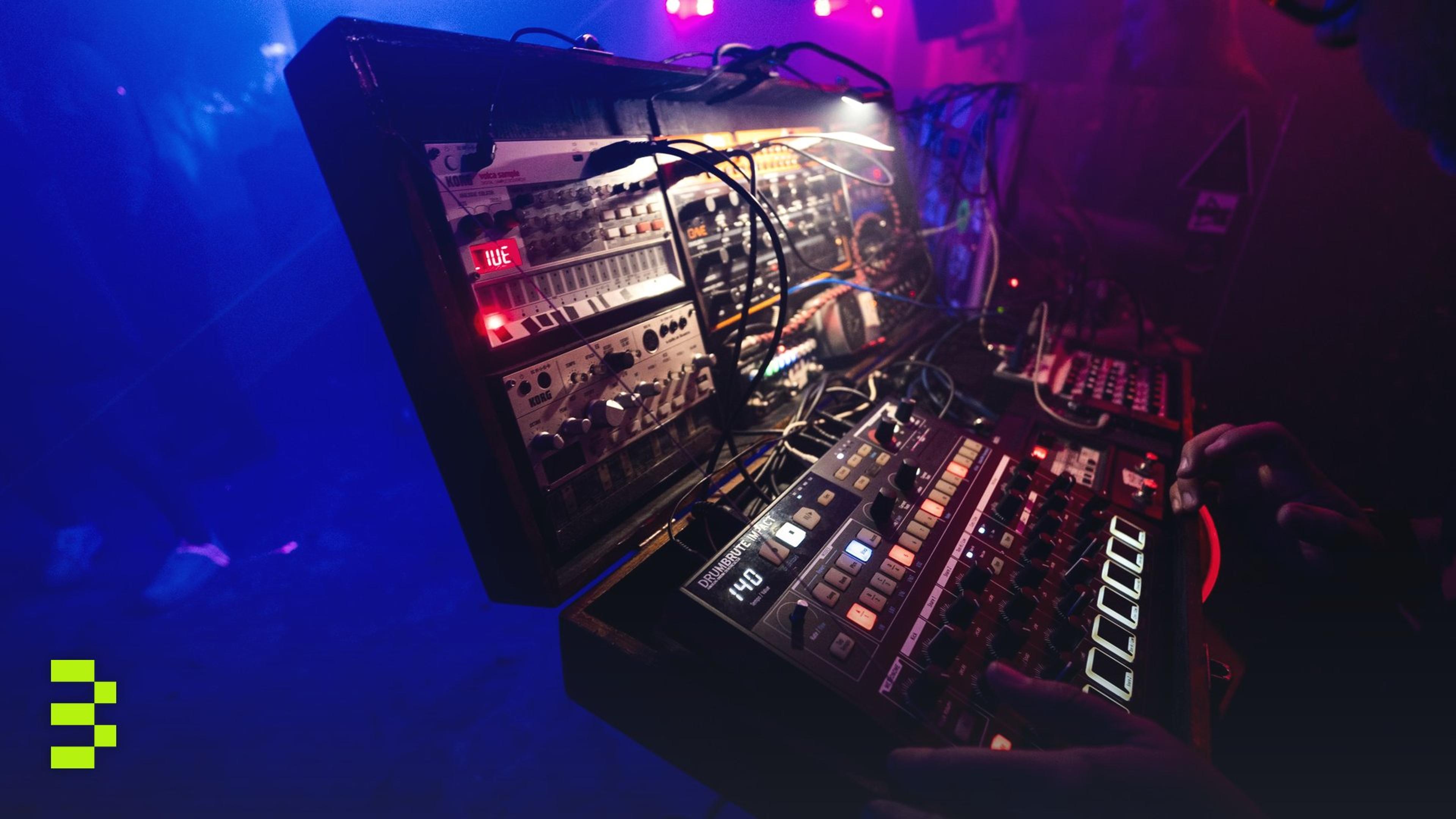 Captivating club scene with a DJ using an electronic mixing console in vibrant lighting.