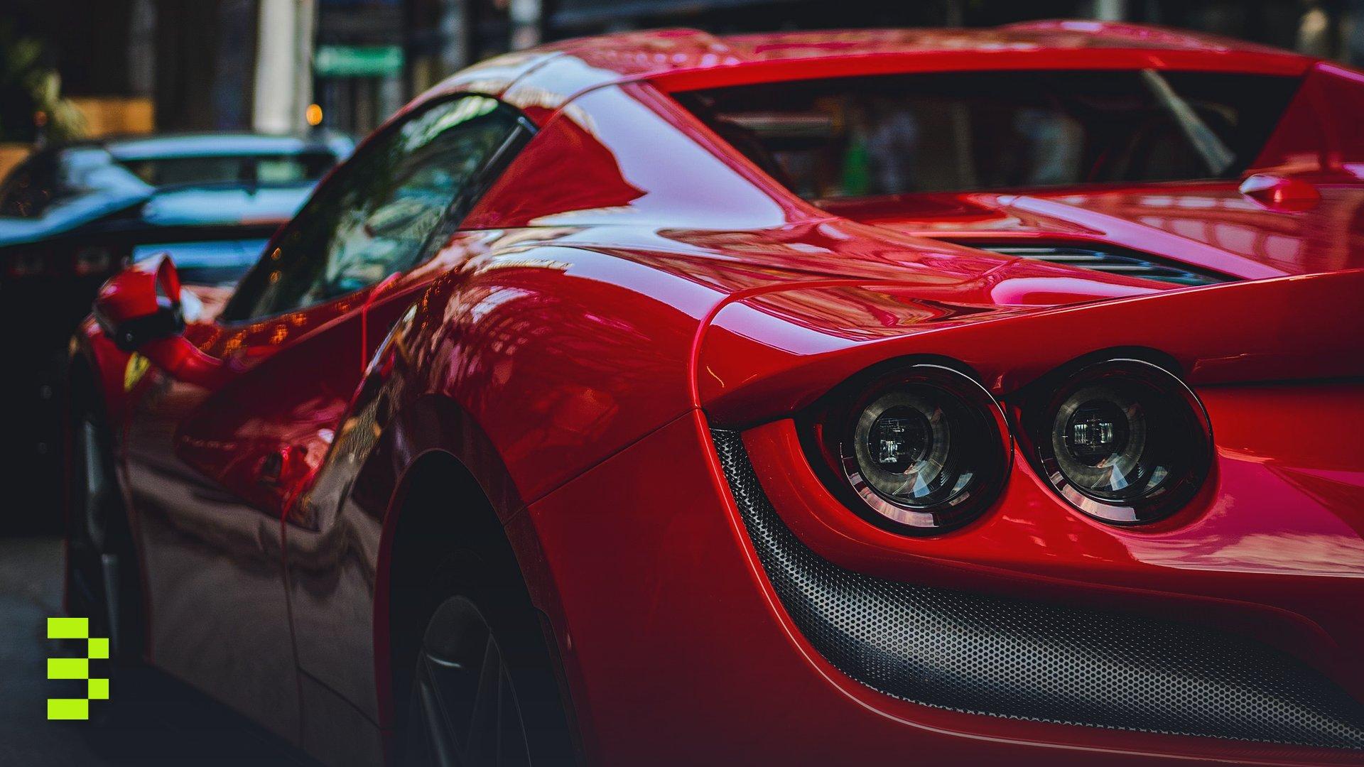 Close-up shot of a luxurious red sports car.
