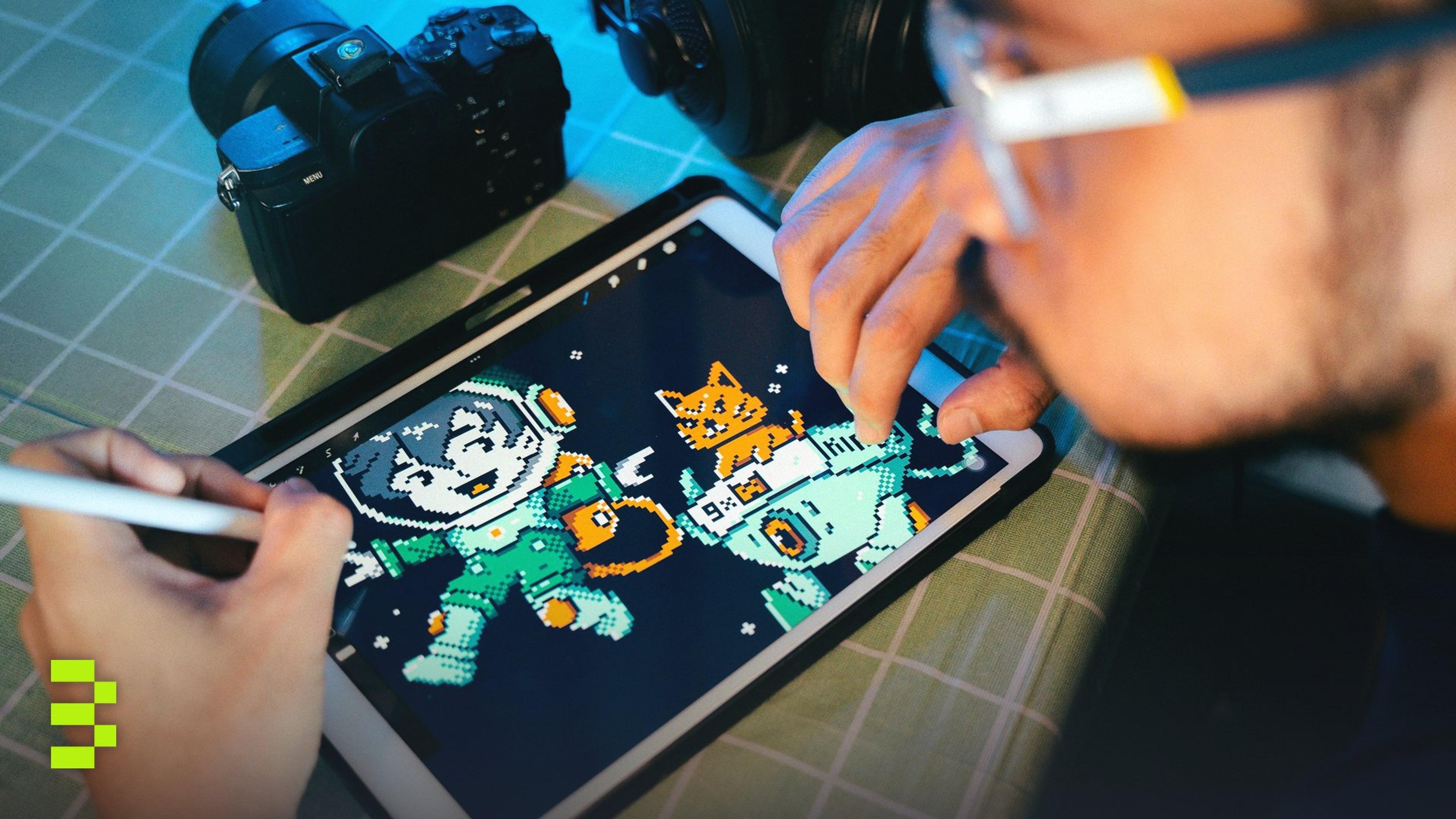 Person drawing digital art on a tablet using a stylus next to camera and headphones.
