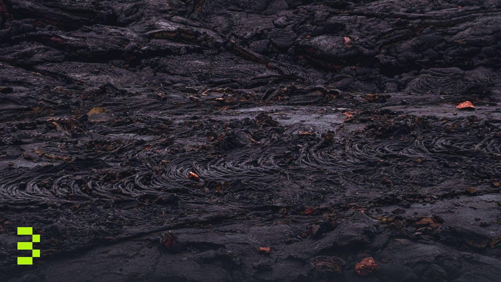 Close-up view of intricate textures on a cooled lava surface.