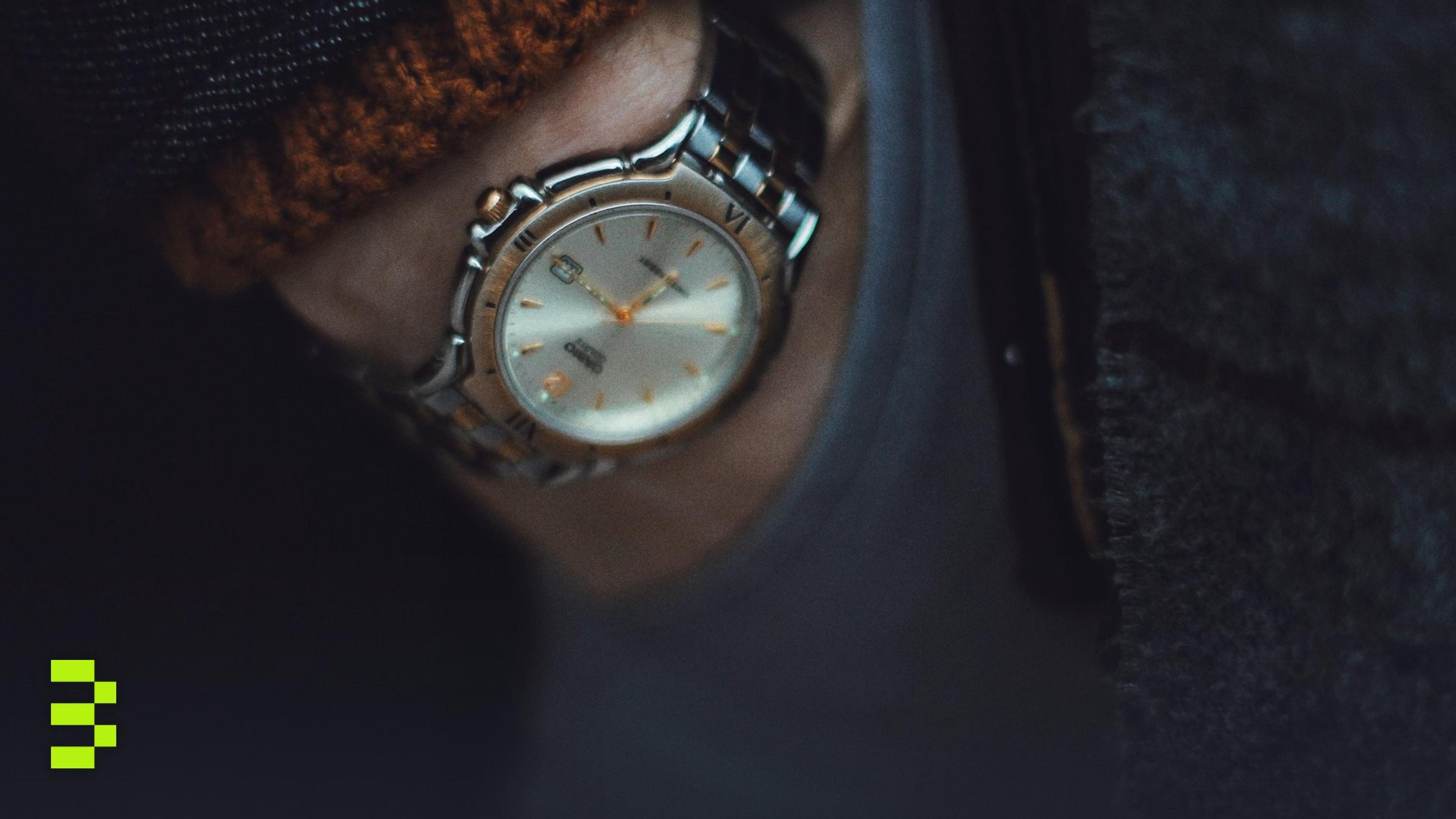 Close-up of a steel wristwatch.