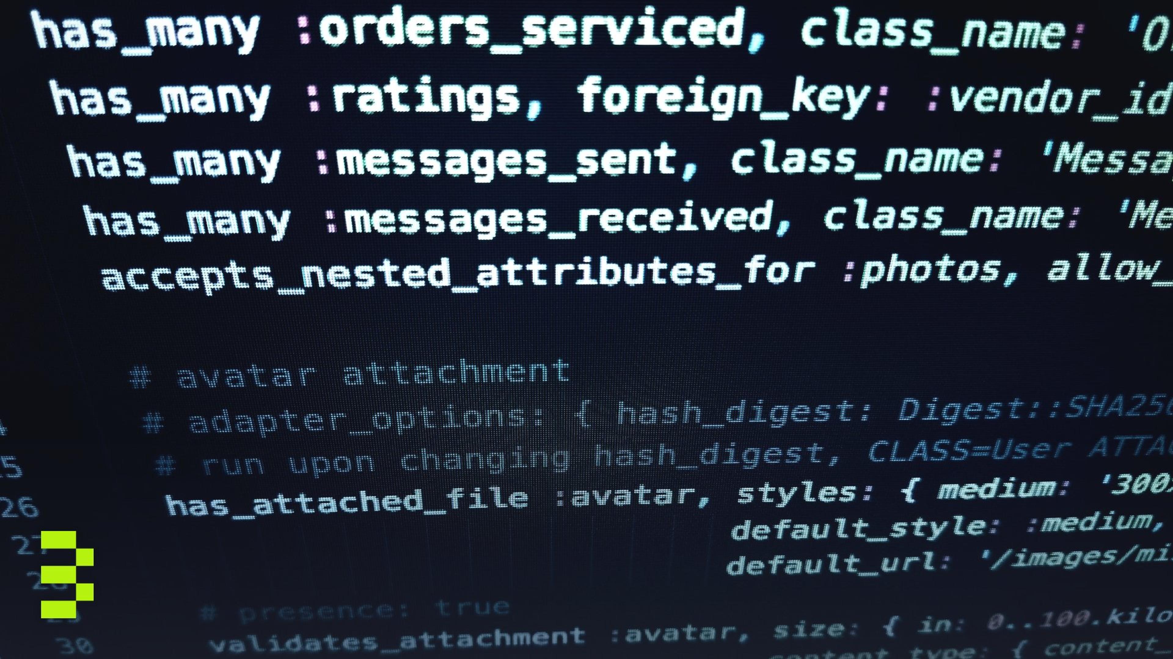 Close-up image featuring detailed programming code on a computer screen.