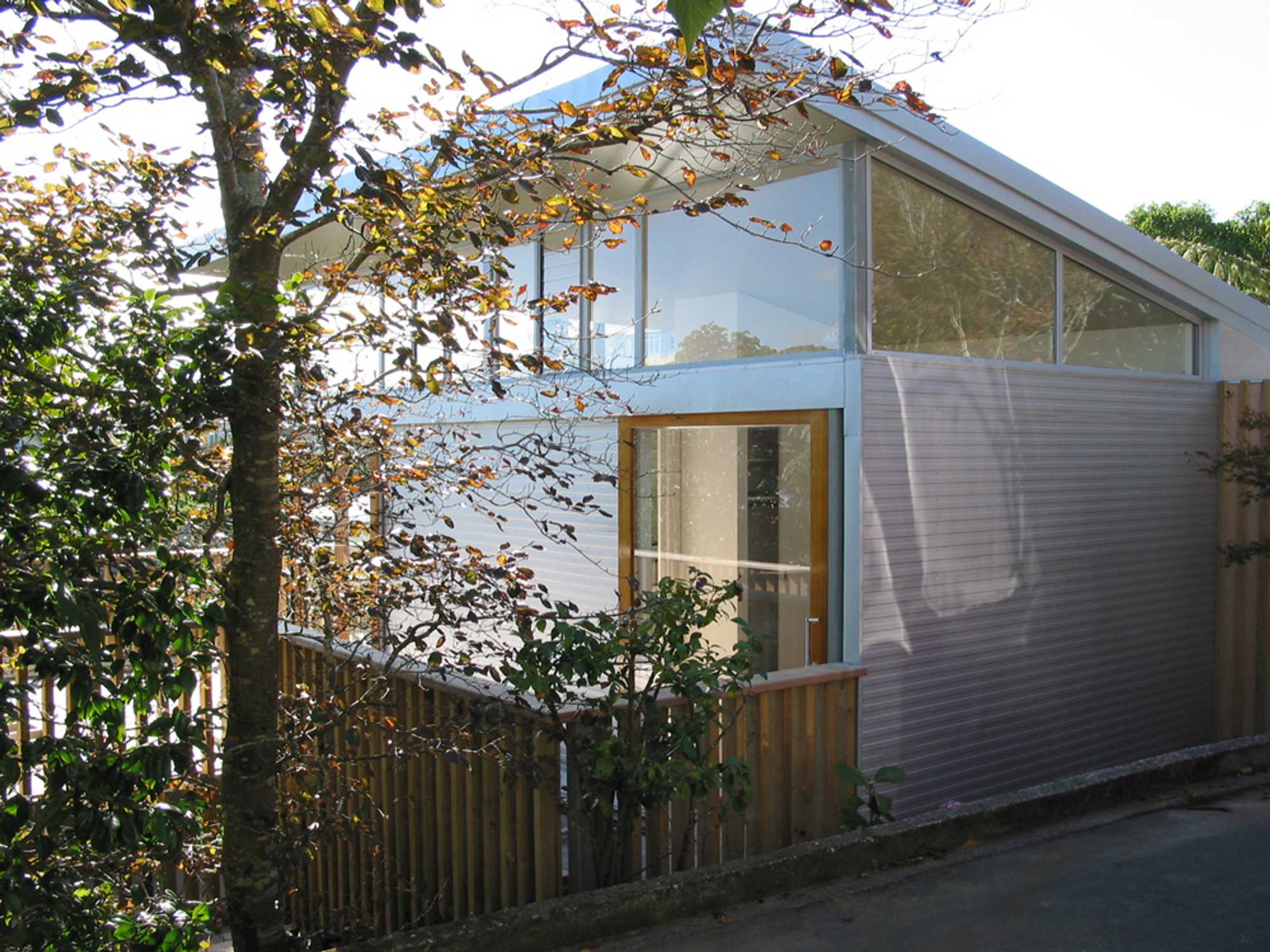 Hillside home Wellington New Zealand architecture award architect contemporary forms natural landscape