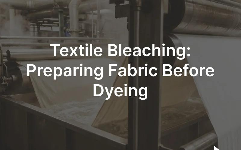 A length of raw greige cotton beside a bright white bleached fabric on a textile mill wet-processing line