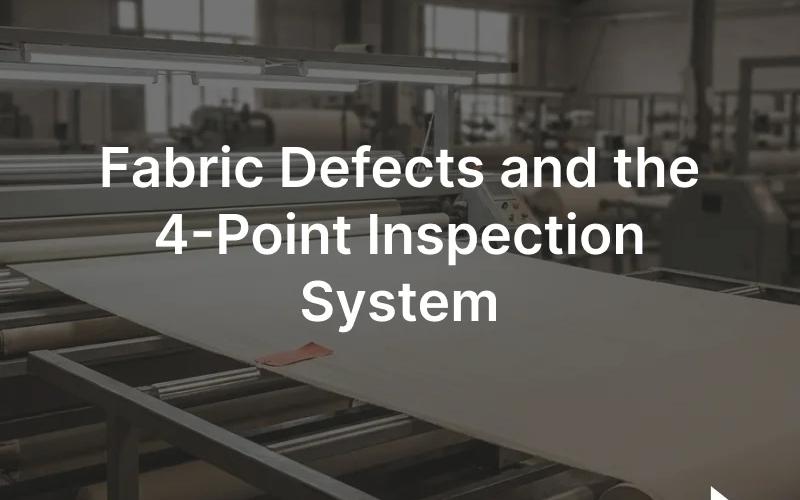 A fabric inspection machine unrolling woven cloth under bright light with an inspector marking defects