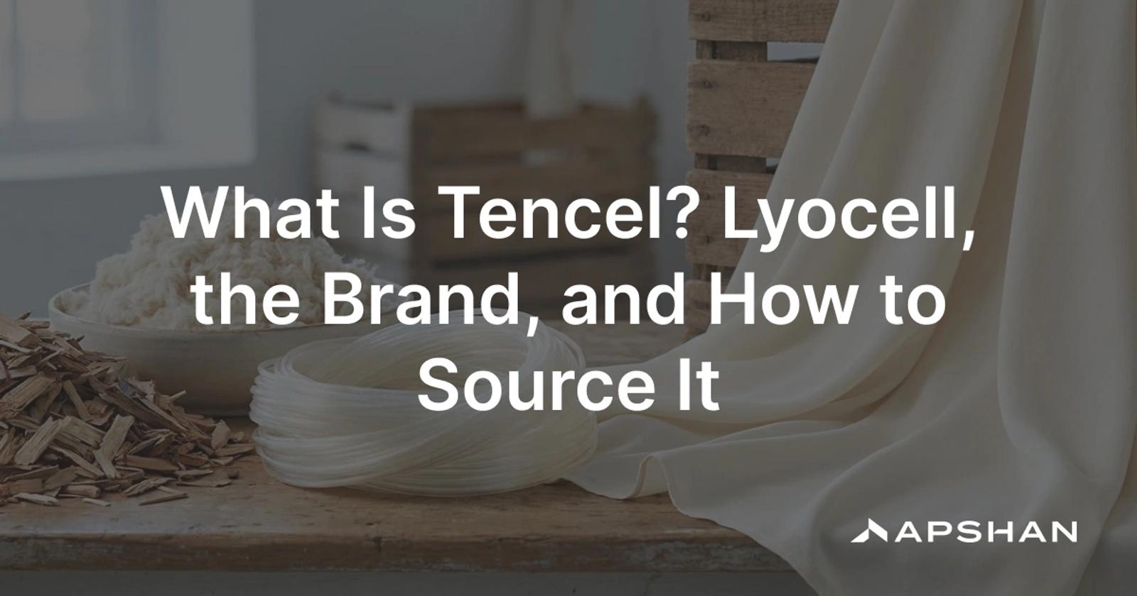 Soft draping Tencel lyocell fabric in a cream tone beside eucalyptus wood pulp, showing the wood-to-fibre cellulosic textile