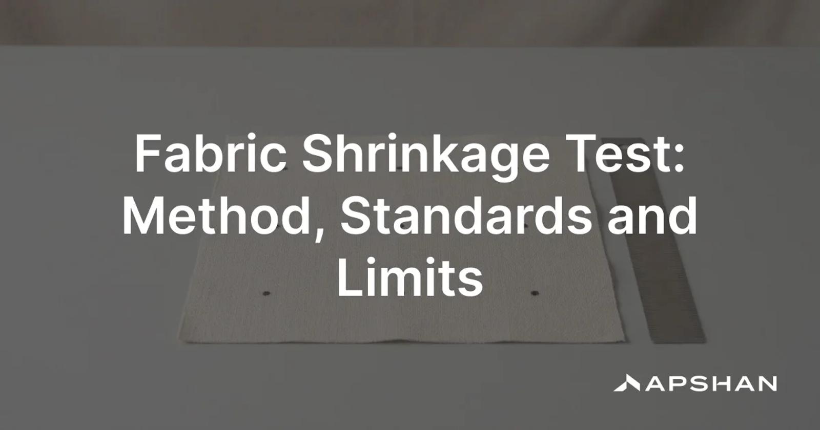 Flat fabric specimen marked with pairs of benchmark points each way, a ruler beside it to measure shrinkage after laundering