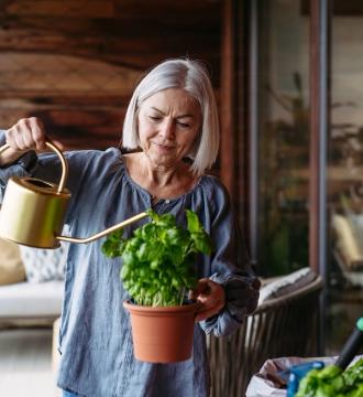 woman watering plant