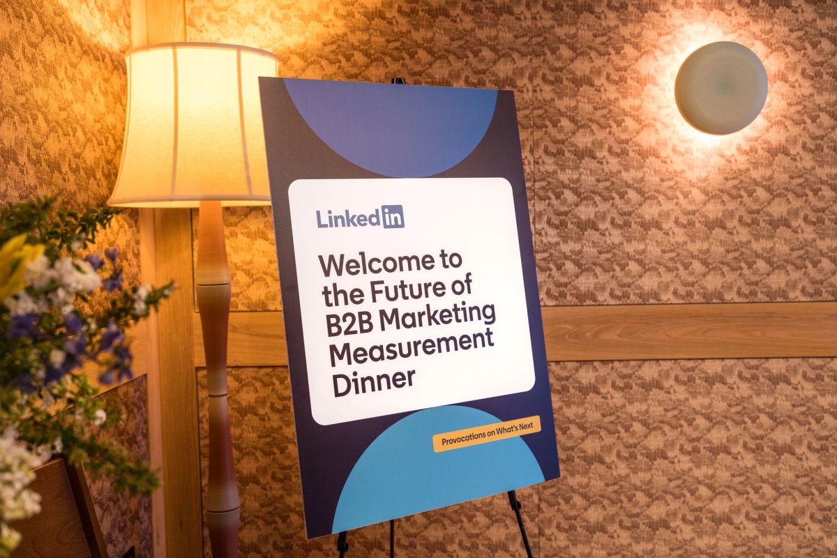 LinkedIn welcome sign for Future of B2B Marketing Measurement Dinner event in warm-lit venue interior
