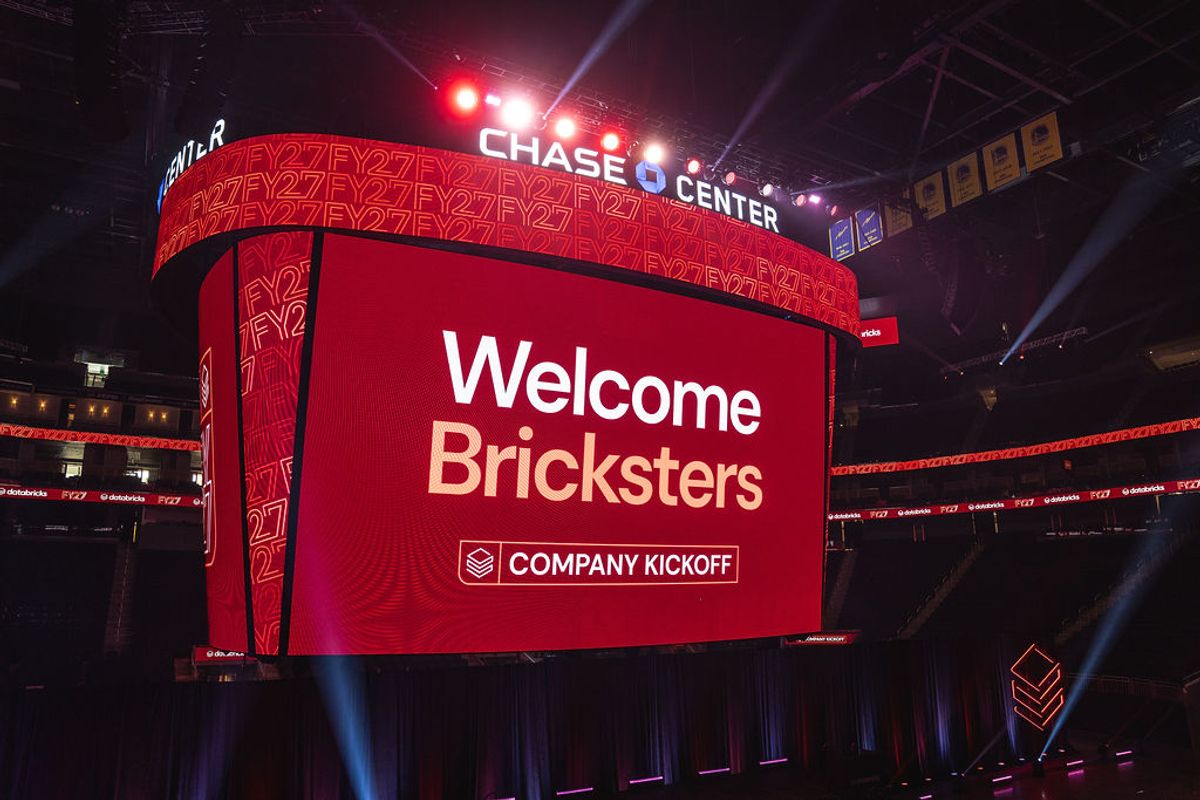 Large screen displays "Welcome Bricksters Company Kickoff" message at Chase Center arena venue