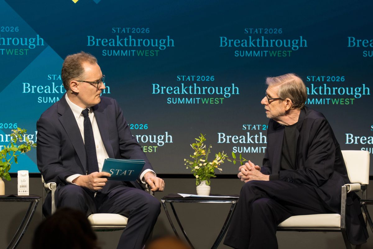 Two speakers in conversation on stage at STAT 2026 Breakthrough Summit West conference event