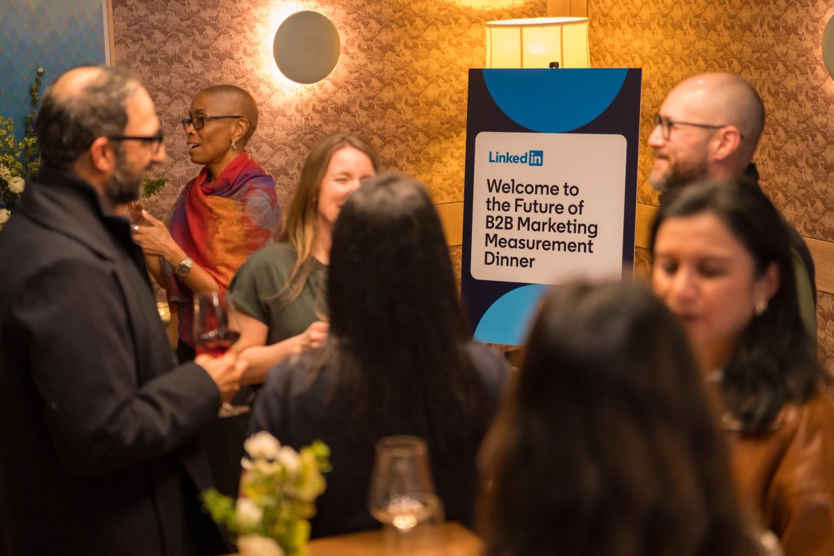 Attendees networking at LinkedIn's Future of B2B Marketing Measurement Dinner in a restaurant setting