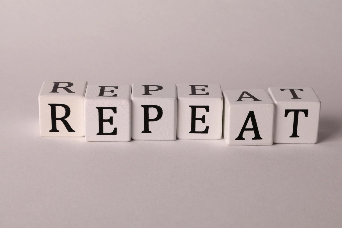 word repeat wpelled out with blocks