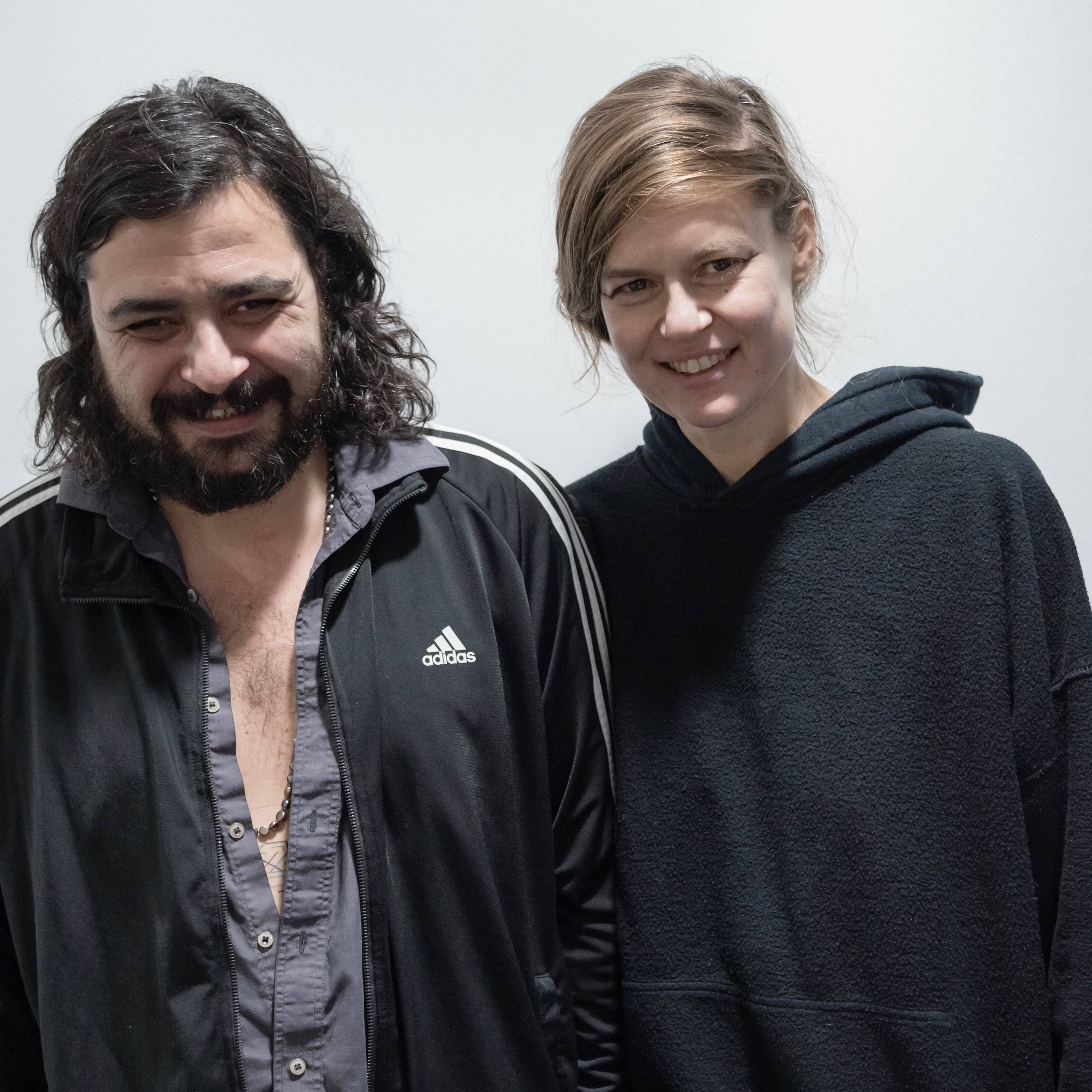 Informal medium-wide portrait of artists Gai Behar and Sharon Eyal.