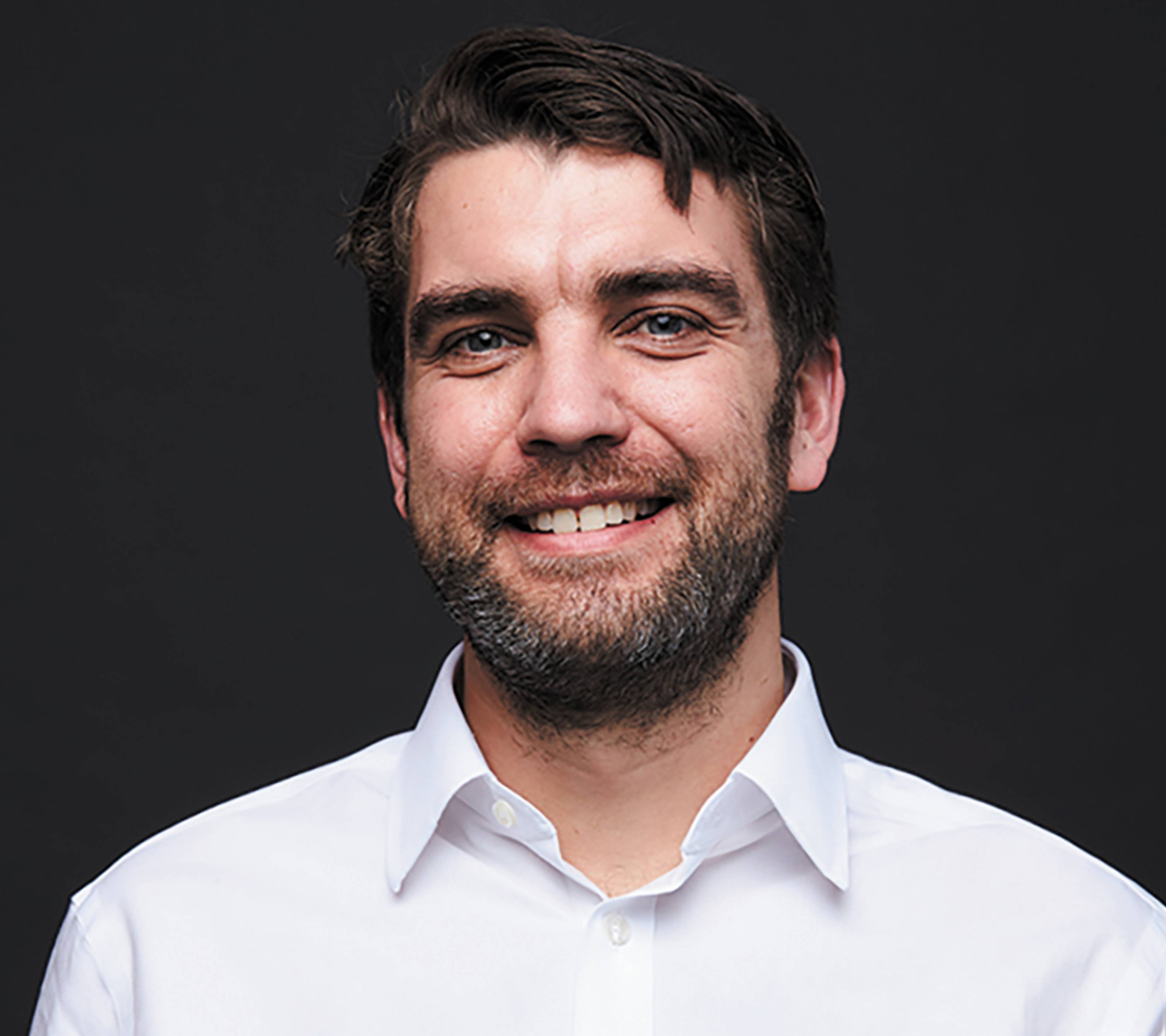 Smiling portrait of Dr. Richard Murray, CEO and co-founder of ORCA Computing.