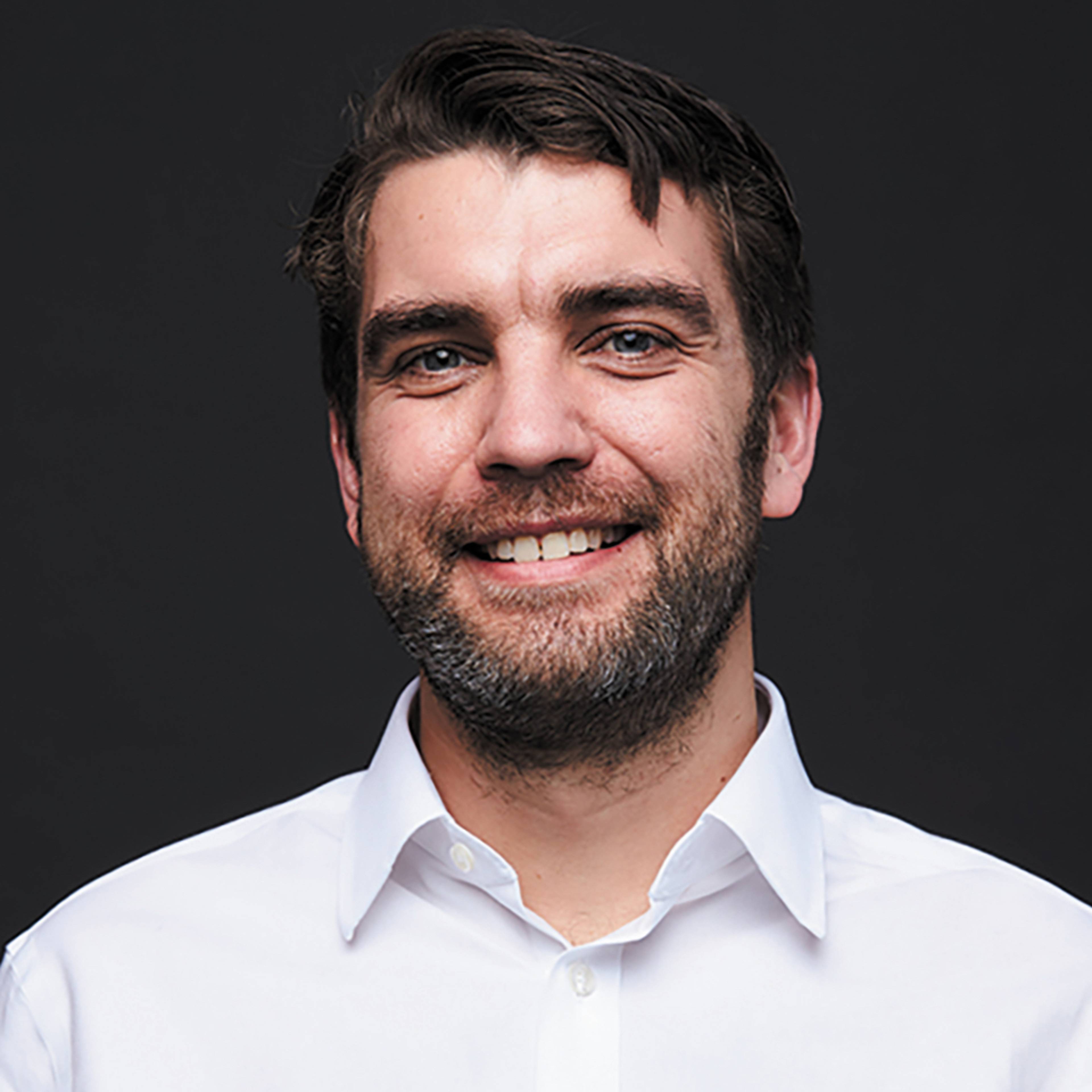 Smiling portrait of Dr. Richard Murray, CEO and co-founder of ORCA Computing.