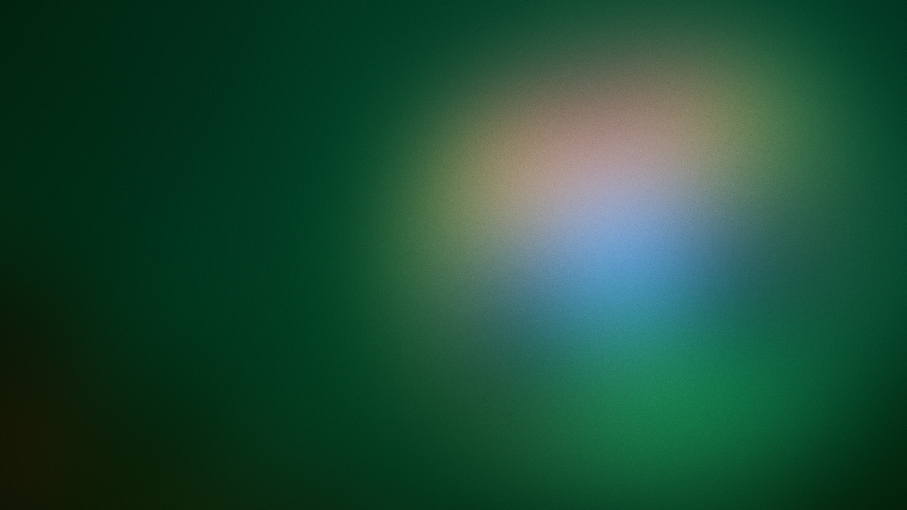 Abstrakter grüner Hintergrund mit einem weichen, mehrfarbigen Lichtverlauf in der Bildmitte.