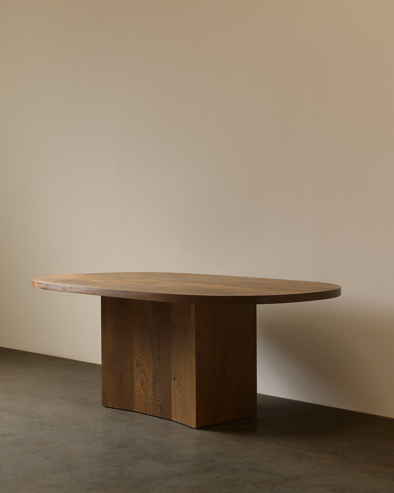 Oval dining table in Fumed White Oak
