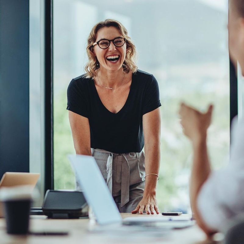 A happy boss in an office