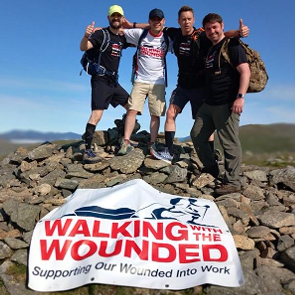 Walking with the wounded team on a summit