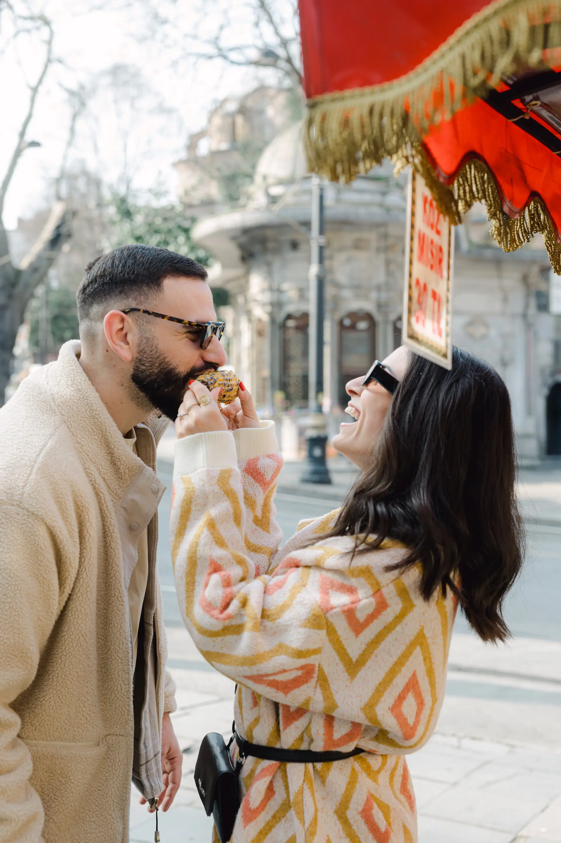 a man and woman eating food