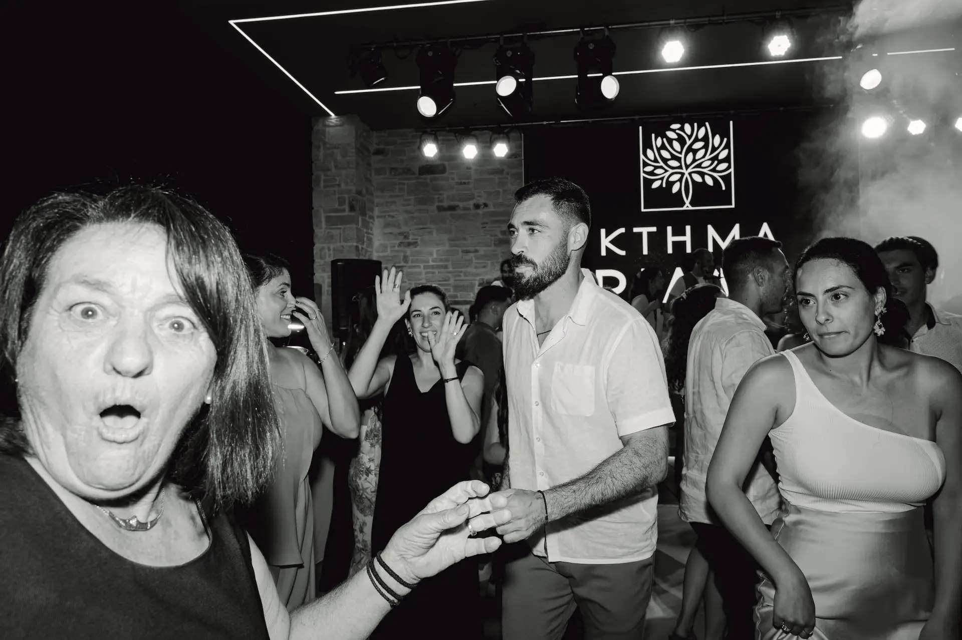 candid moment of people having fun during wedding party