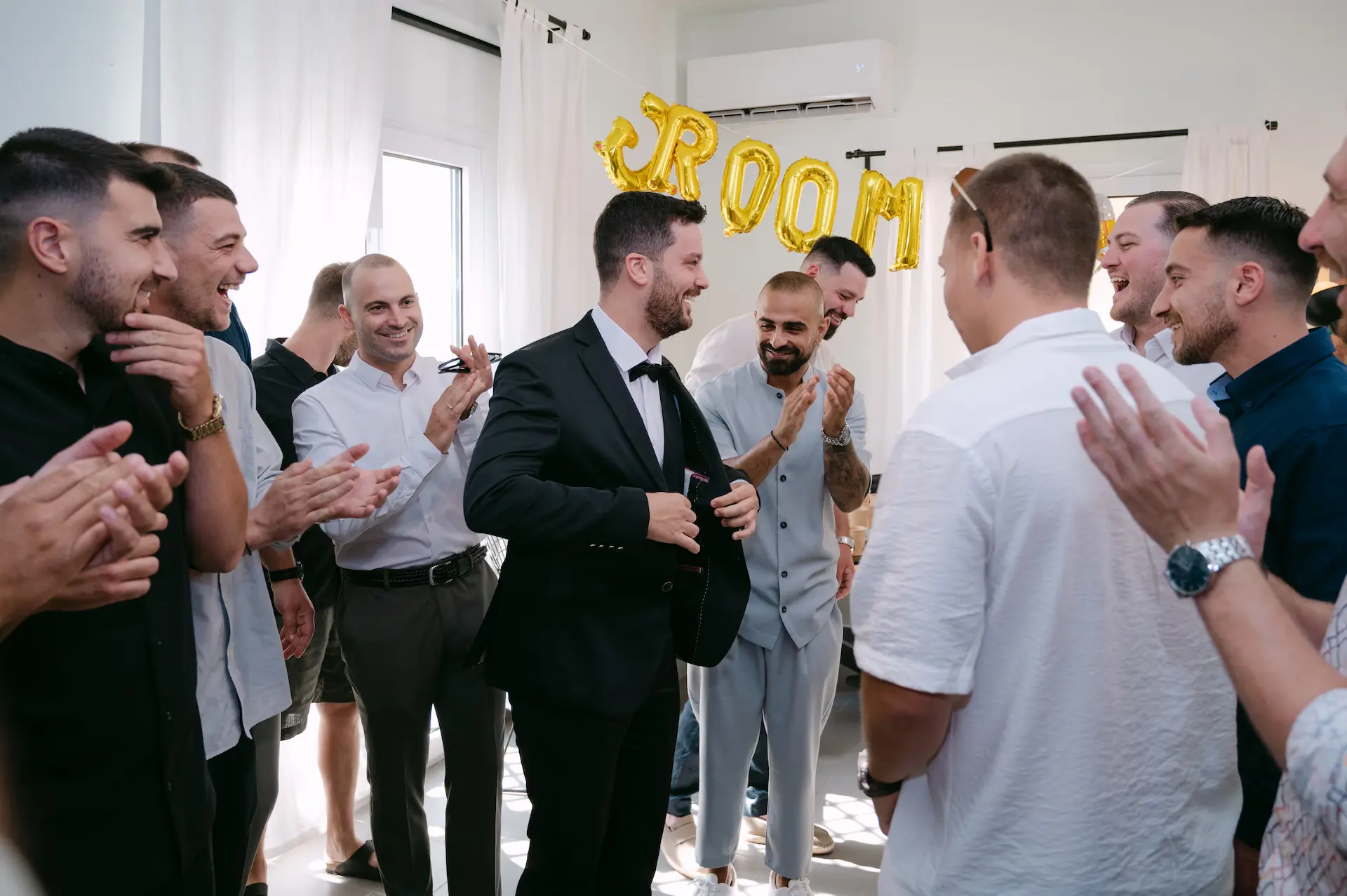 a group of men standing in a room