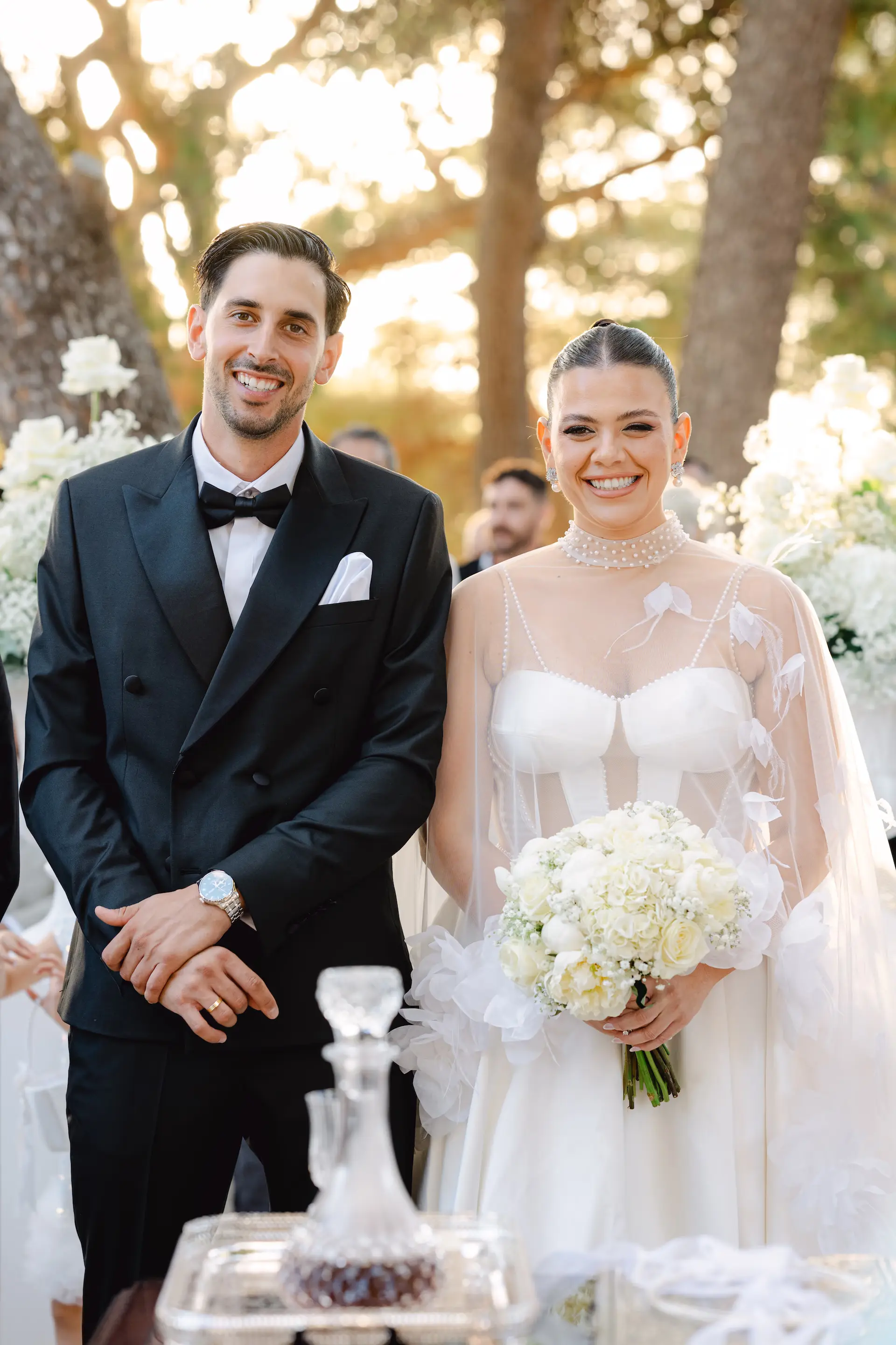 portrait of bride and groom smiling during ceremony
