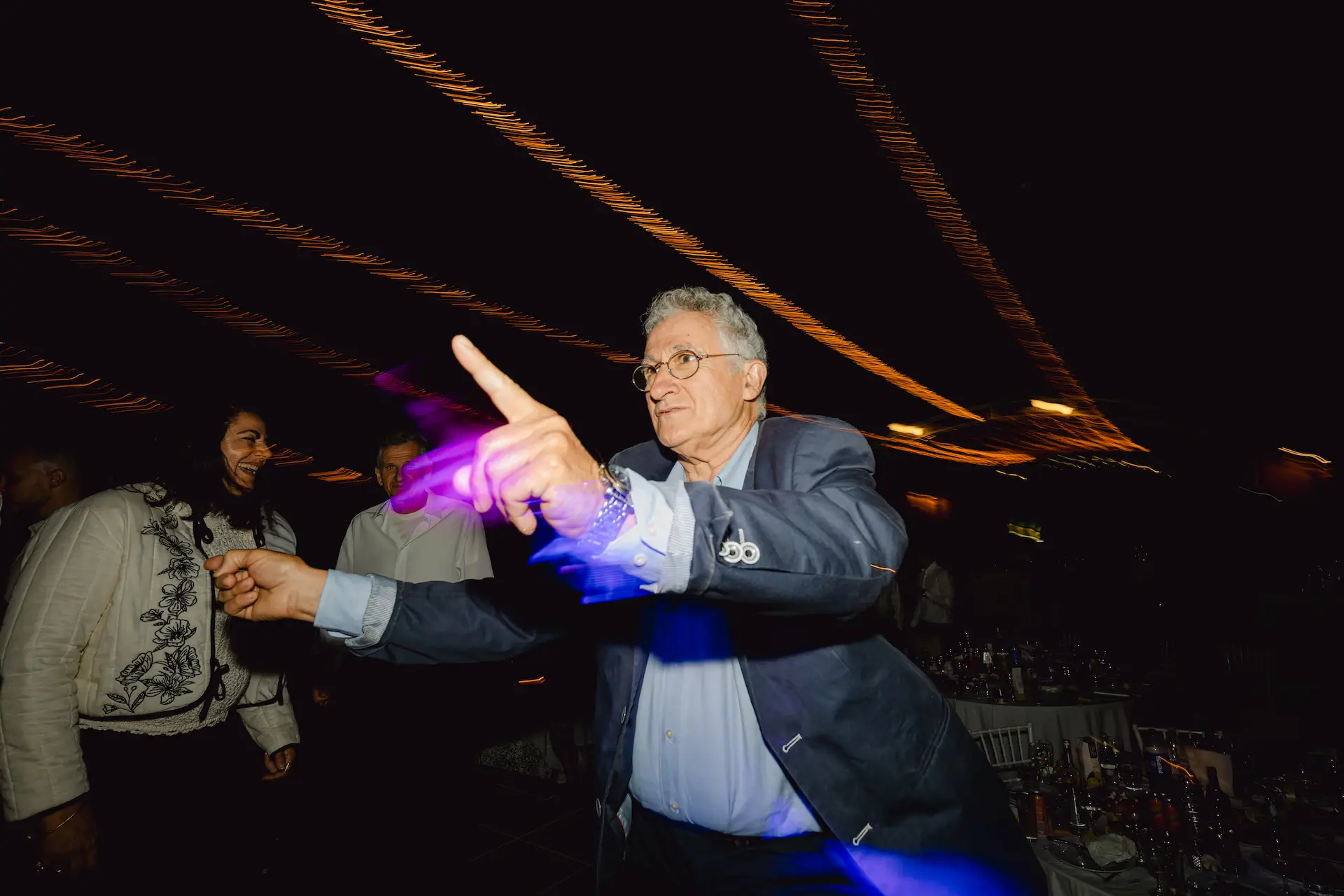 senior man having a blast at the dance floor