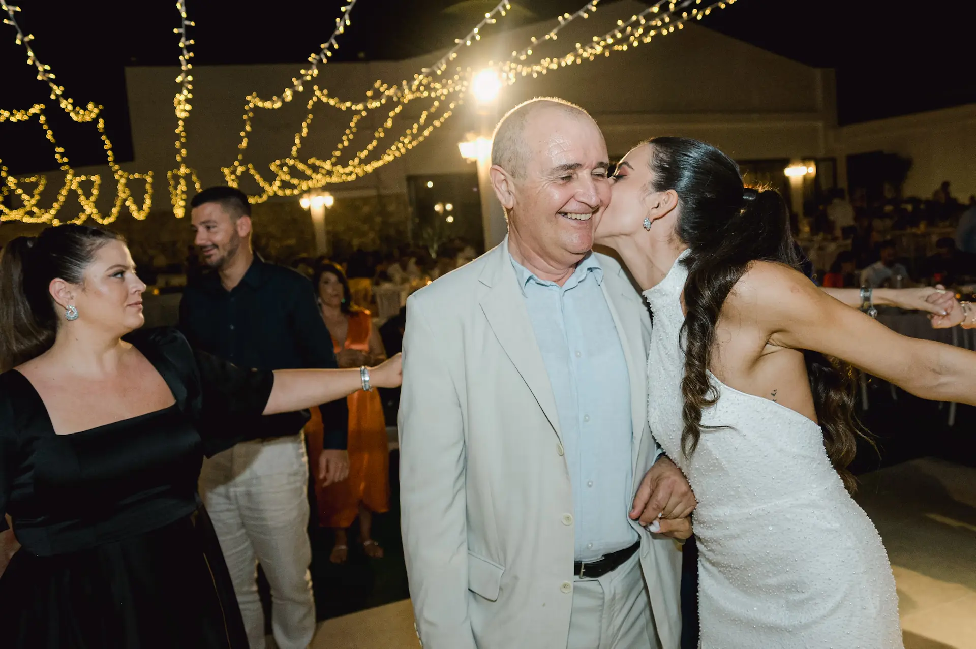 a woman kissing a man