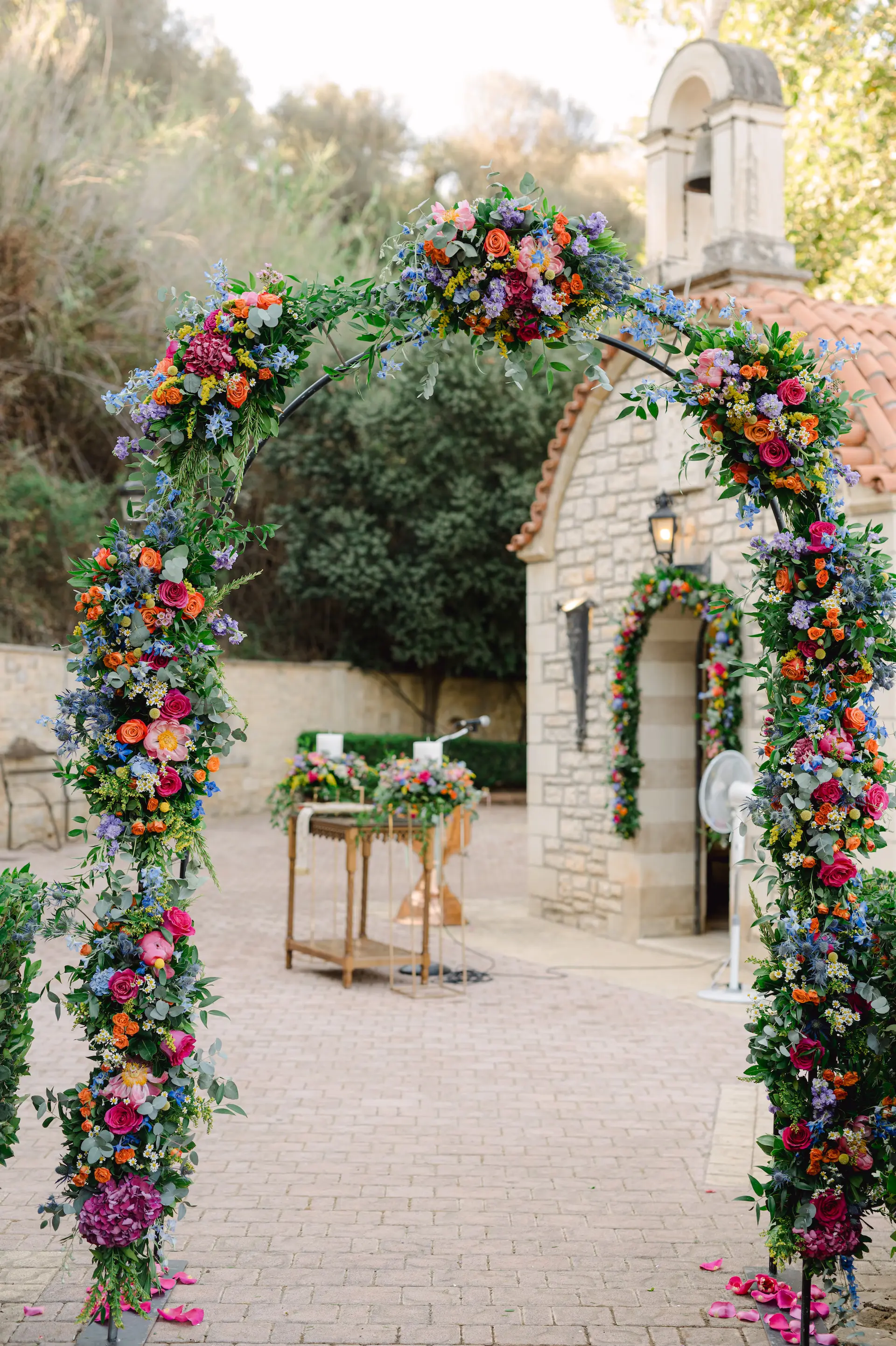 a flower arch with flowers on it