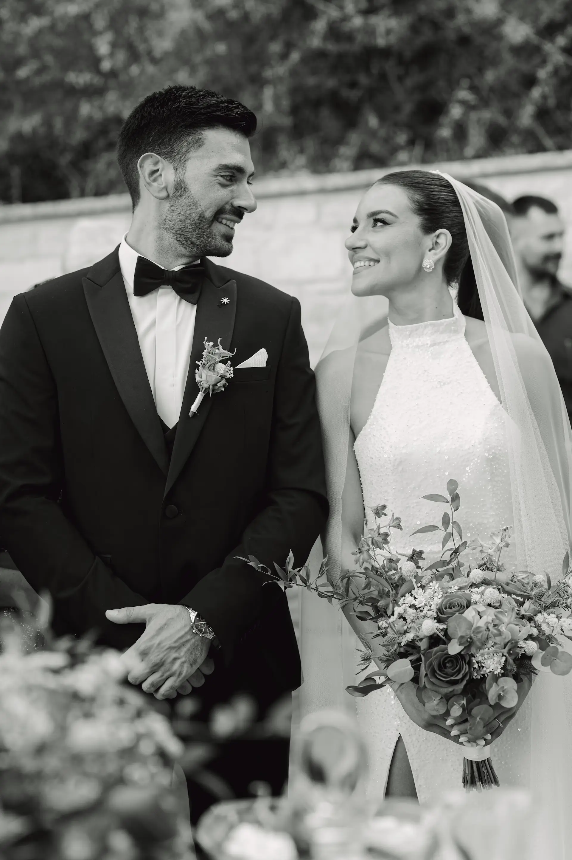 a man and woman smiling at each other