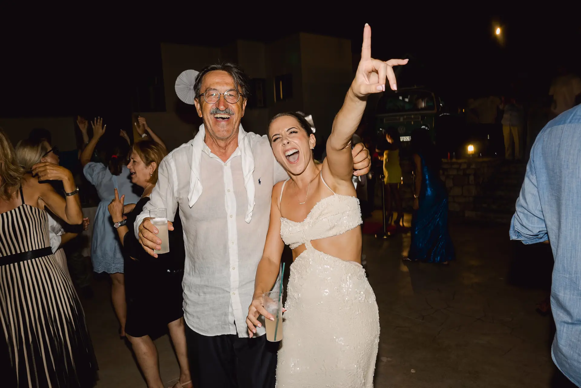 a man and woman dancing posing for a picture 
