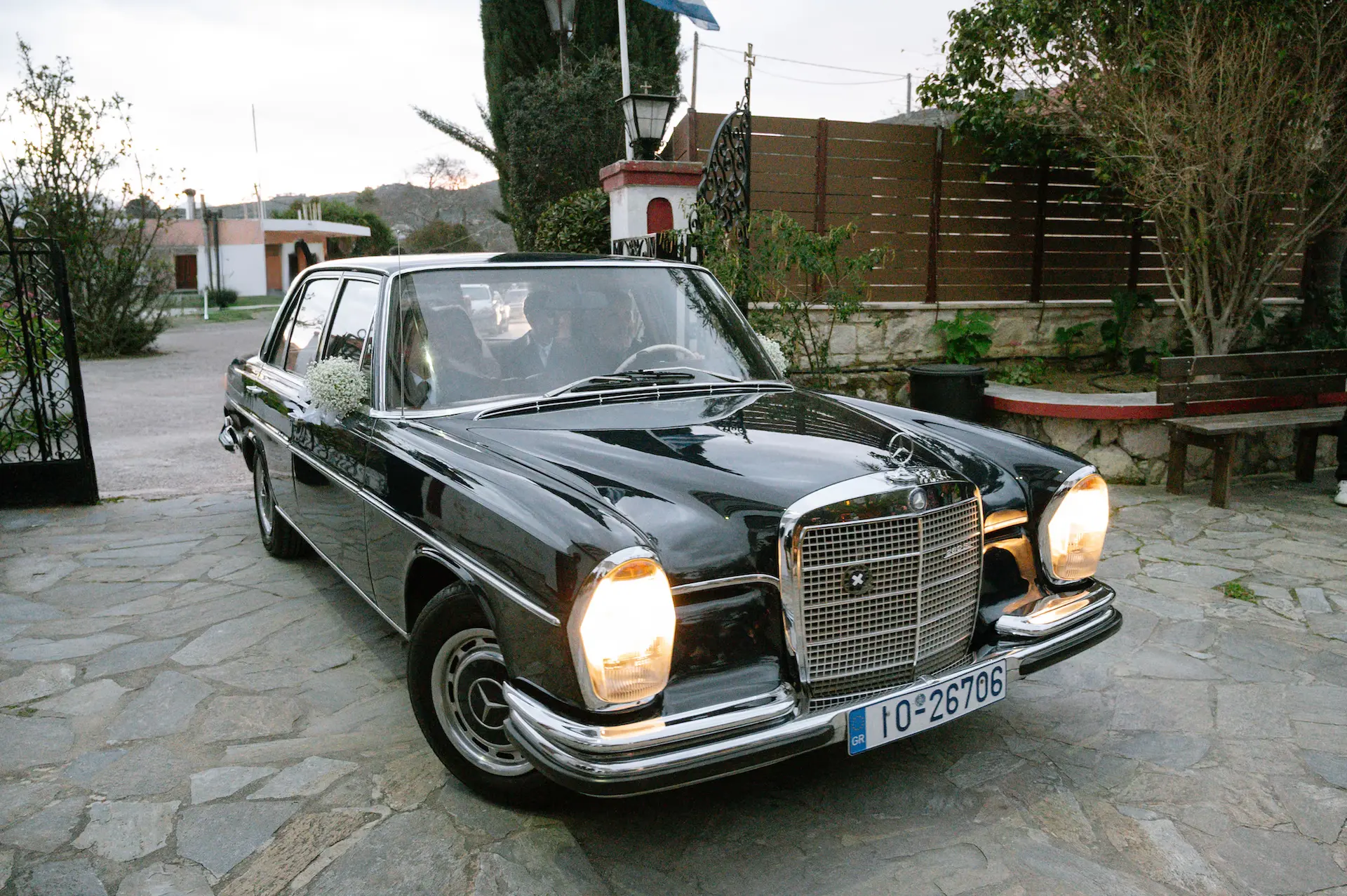 the arrival of the bride with a vintage mercedes-benz car