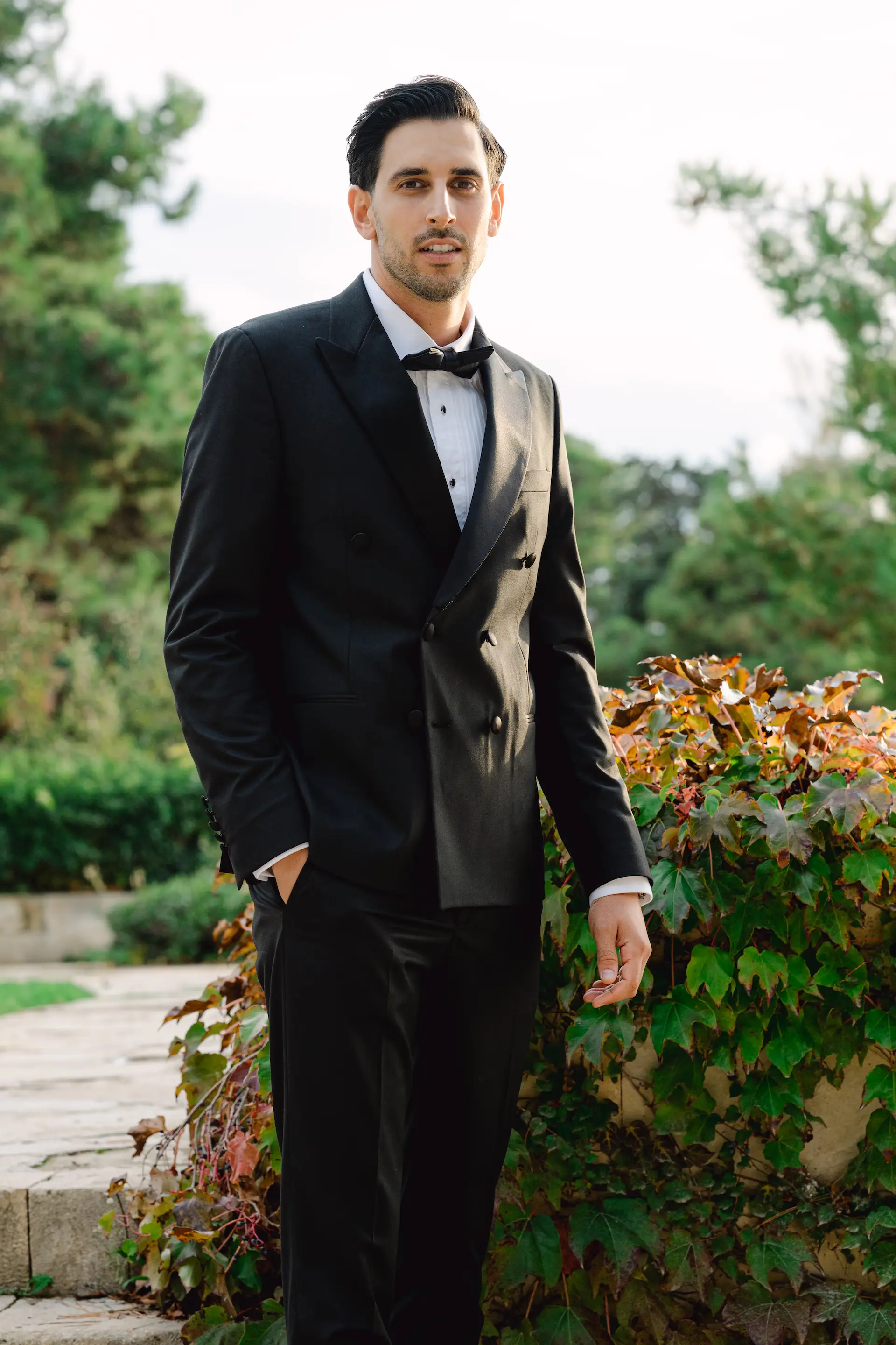 editorial portrait of the groom in natural light