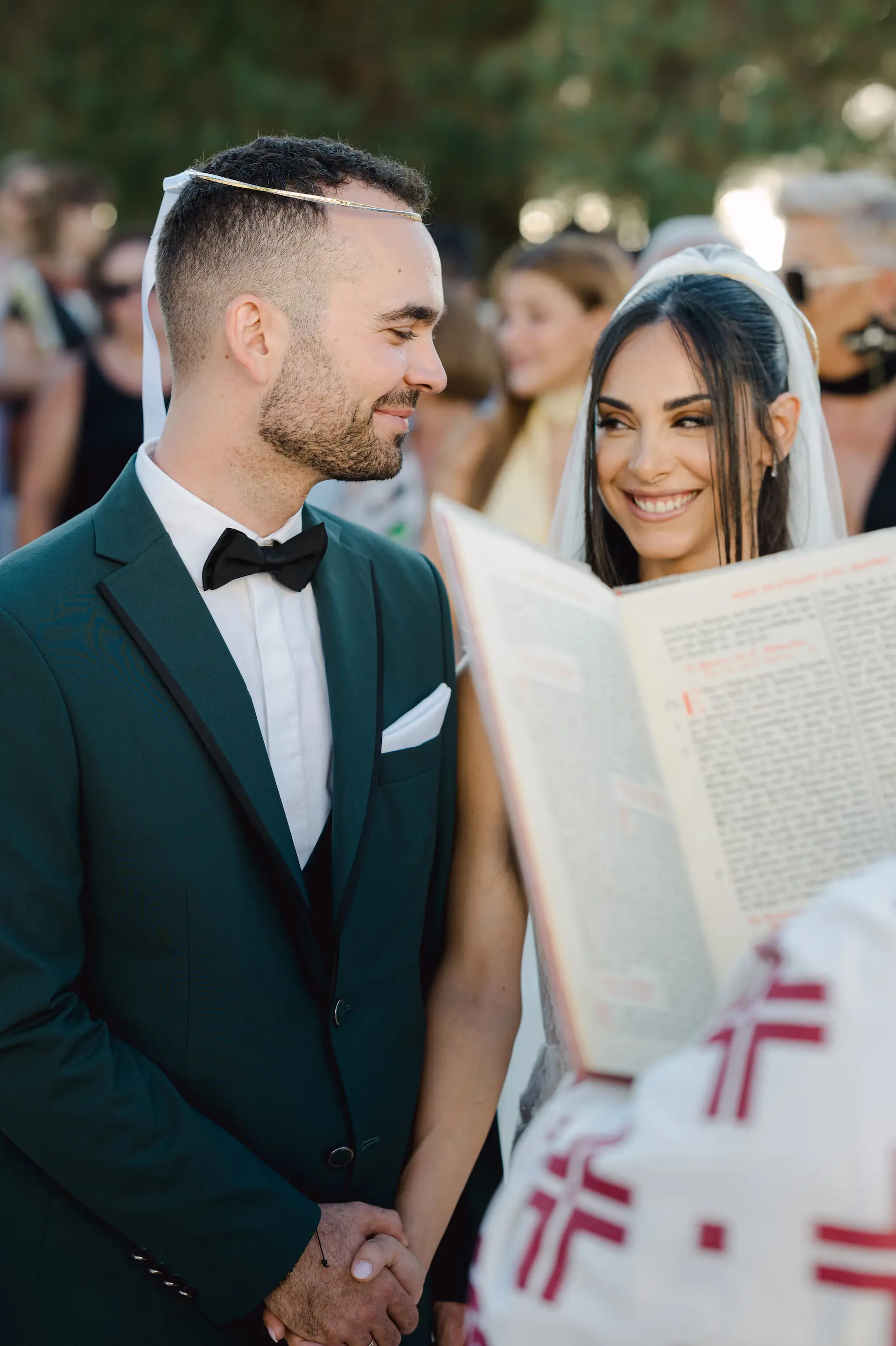 Candid wedding photography capturing the genuine chemistry and smiles between a bride and groom.
