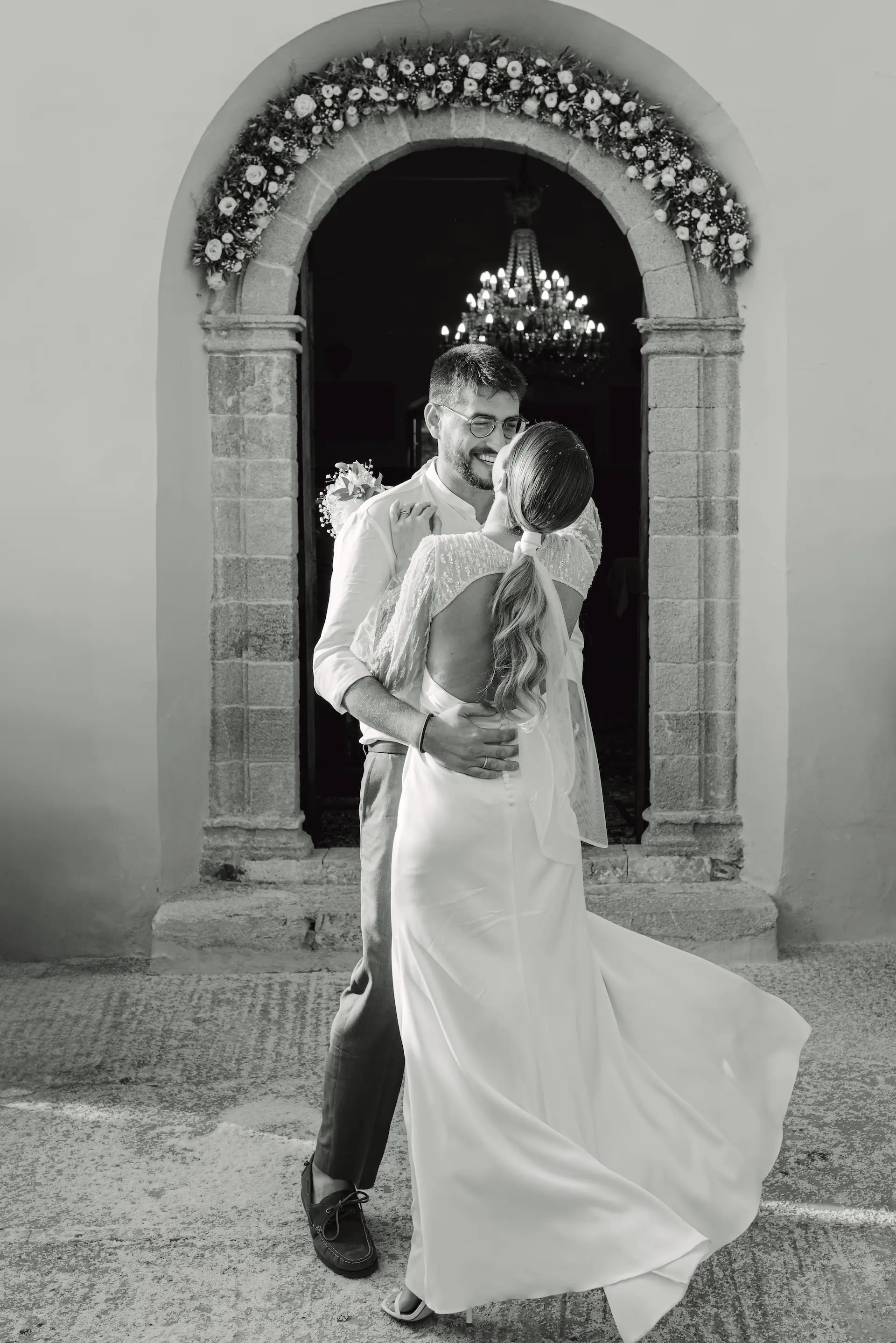 couple kissing after their wedding