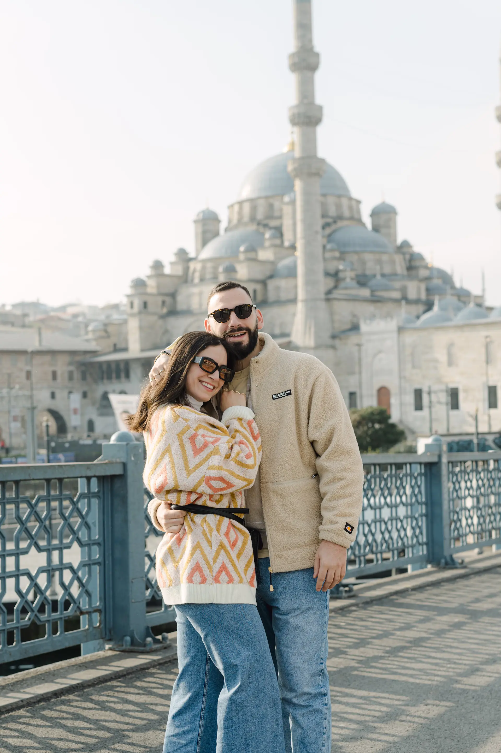 a man and woman posing for a picture