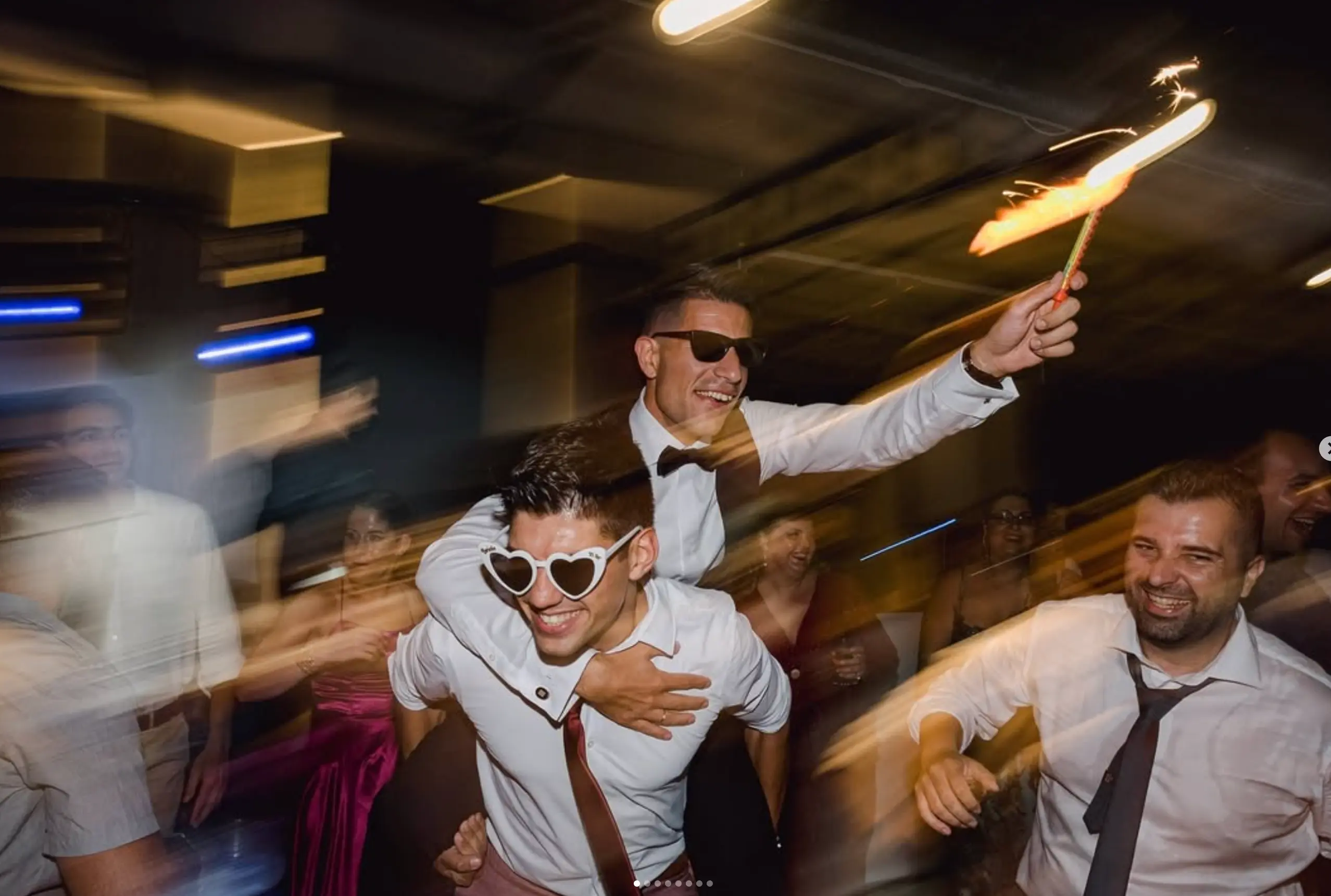 a man carrying another man on his back