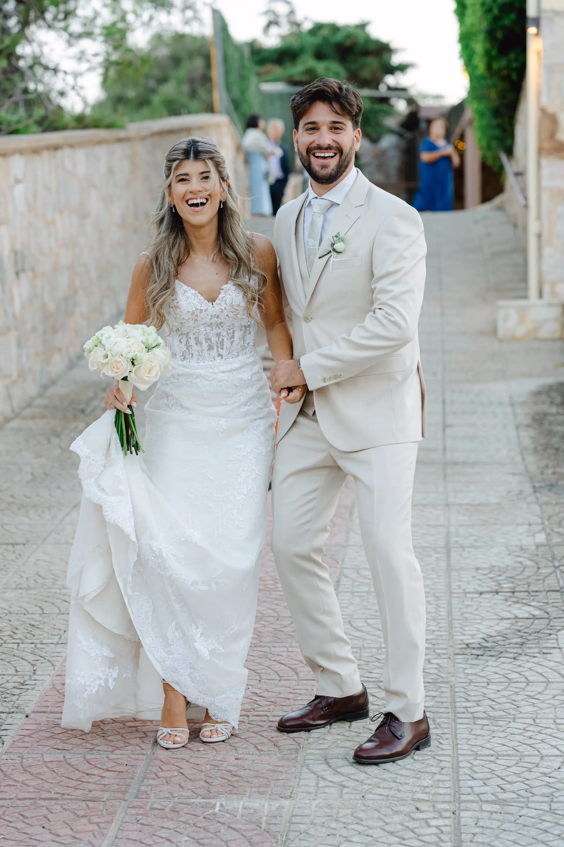 Candid and elegant shot of the newlyweds in an unscripted, loving interaction