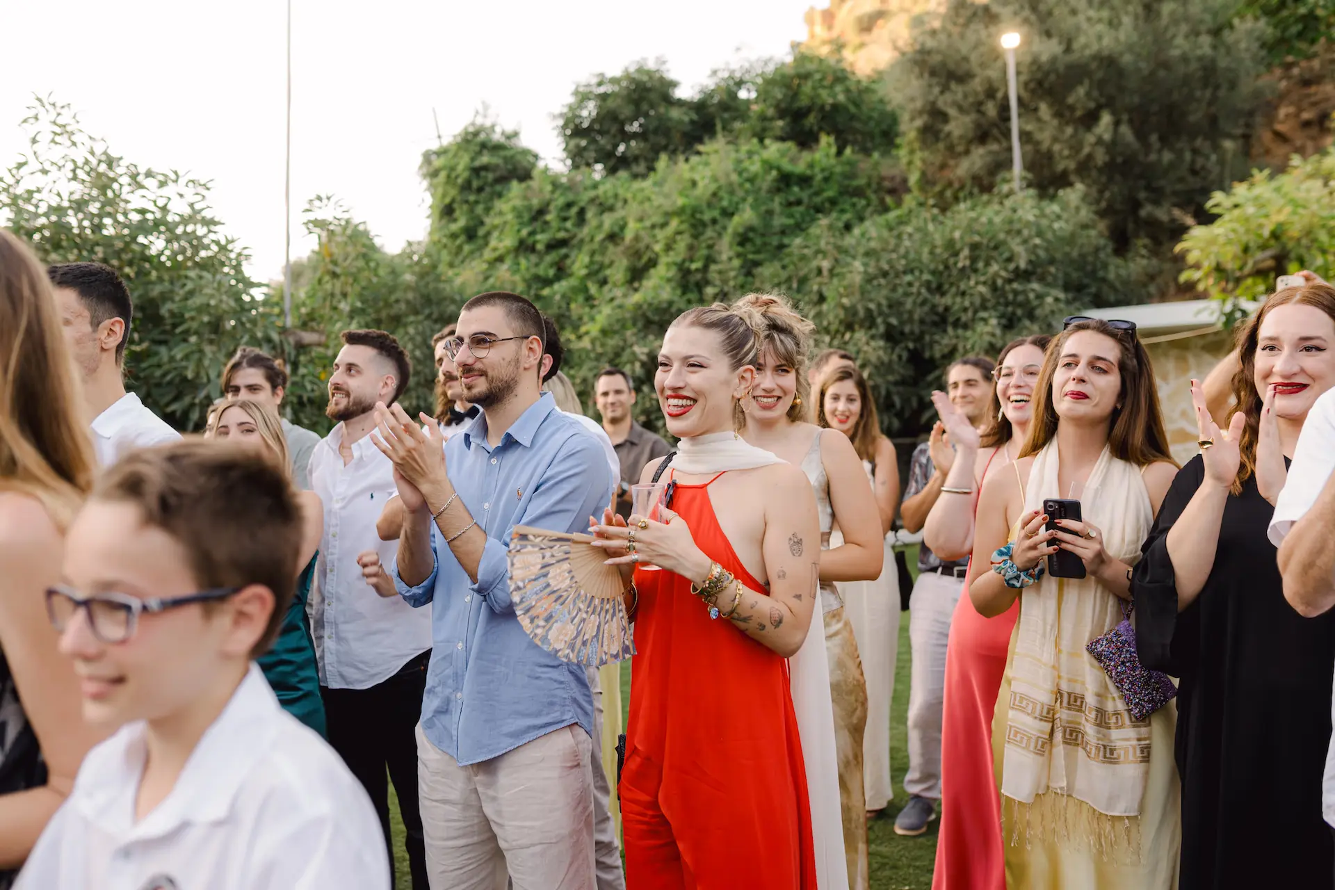 a group of guests standing in a line 